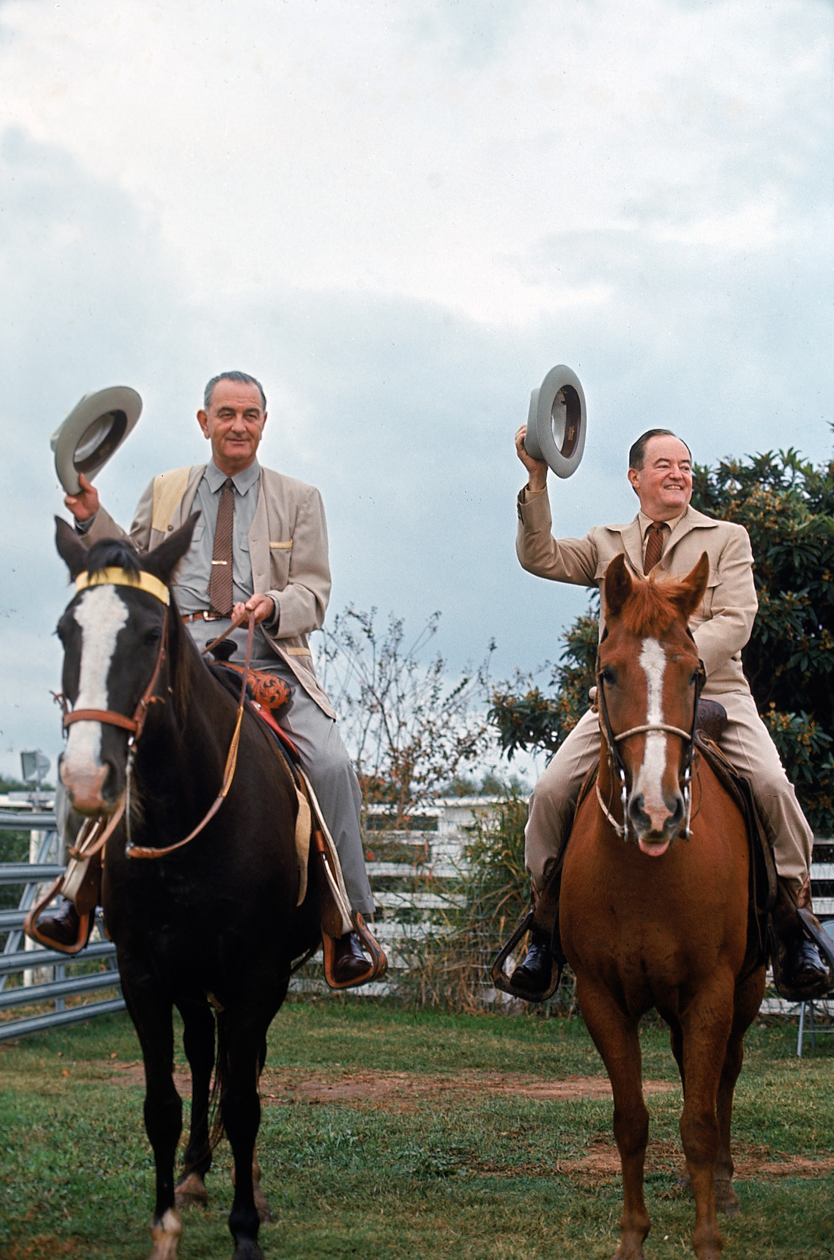 Taking the reins. At the LBJ ranch, the President and vice president-elect saddle up. Johnson outfitted Humphrey with cowboy clothes and then mounted him on a frisky quarter horse, El Rey, while he rode his Tennessee walker, Lady B. Then they went out to round up cattle. Humphrey was game but not expert.