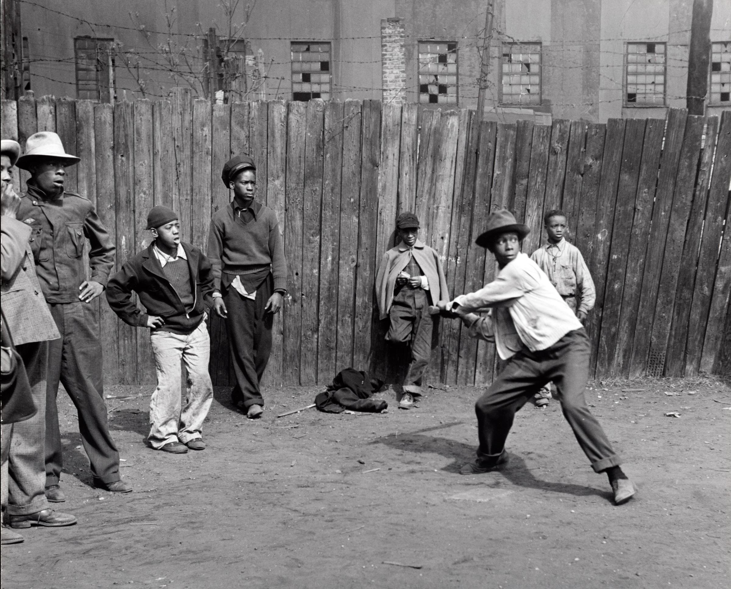 Wayne Miller photograph of children playing sandlot baseball circa 1946-1948.