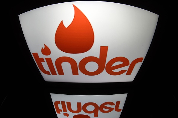 A picture shows the logo of dating app Tinder on a tablet in Paris on March 15, 2016. / AFP / LIONEL BONAVENTURE        (Photo credit should read LIONEL BONAVENTURE/AFP/Getty Images) (LIONEL BONAVENTURE&mdash;AFP/Getty Images)