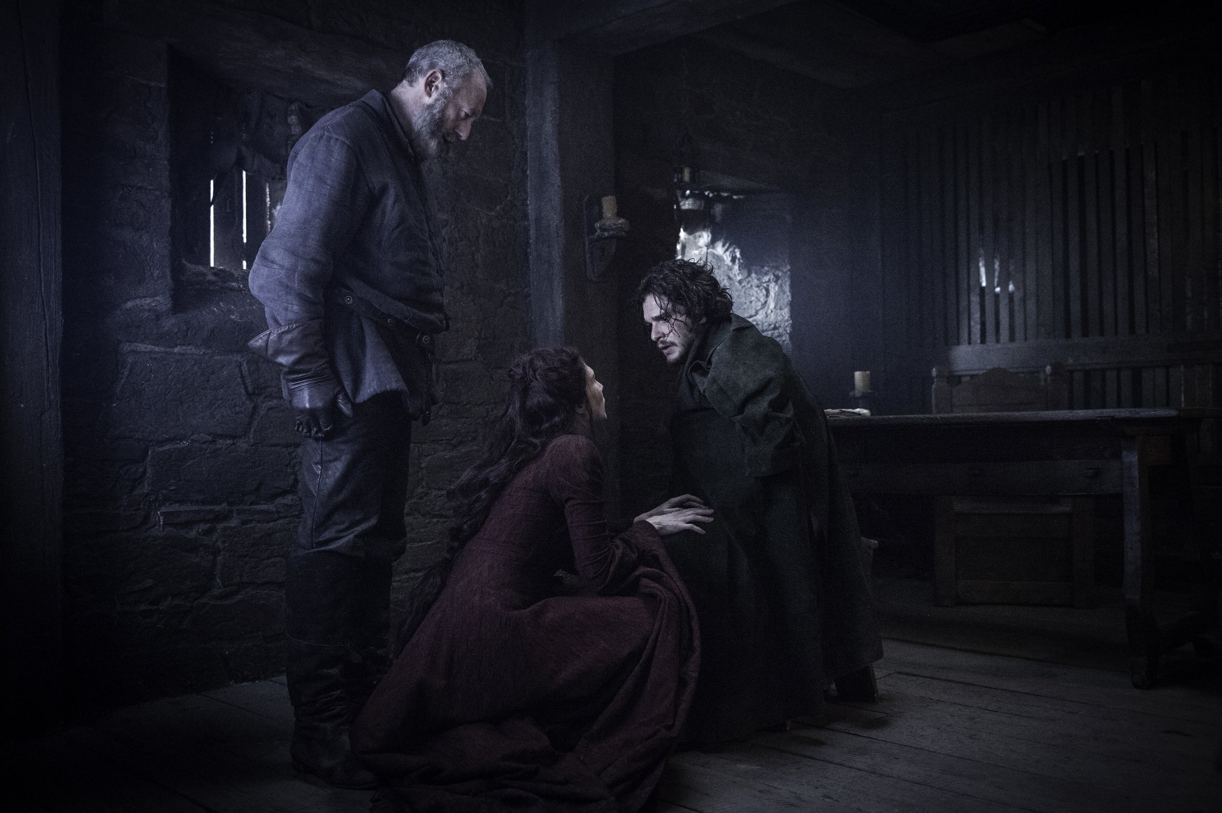 Liam Cunningham as Ser Davos, Carice van Houten as Melisandre and Kit Harington as Jon Snow