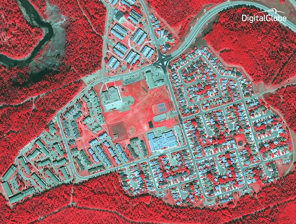 A before-after gif of satellite images captured May 29, 2015, and May 5, 2016, by DigitalGlobe, using short wave infrared imagery, shows the destruction in the Hillview Park neighborhood of Fort McMurray, the oil boomtown in Alberta, Canada, which has been decimated by a massive wildfire. (Photos by DigitalGlobe, GIF by Marisa Gertz for TIME)