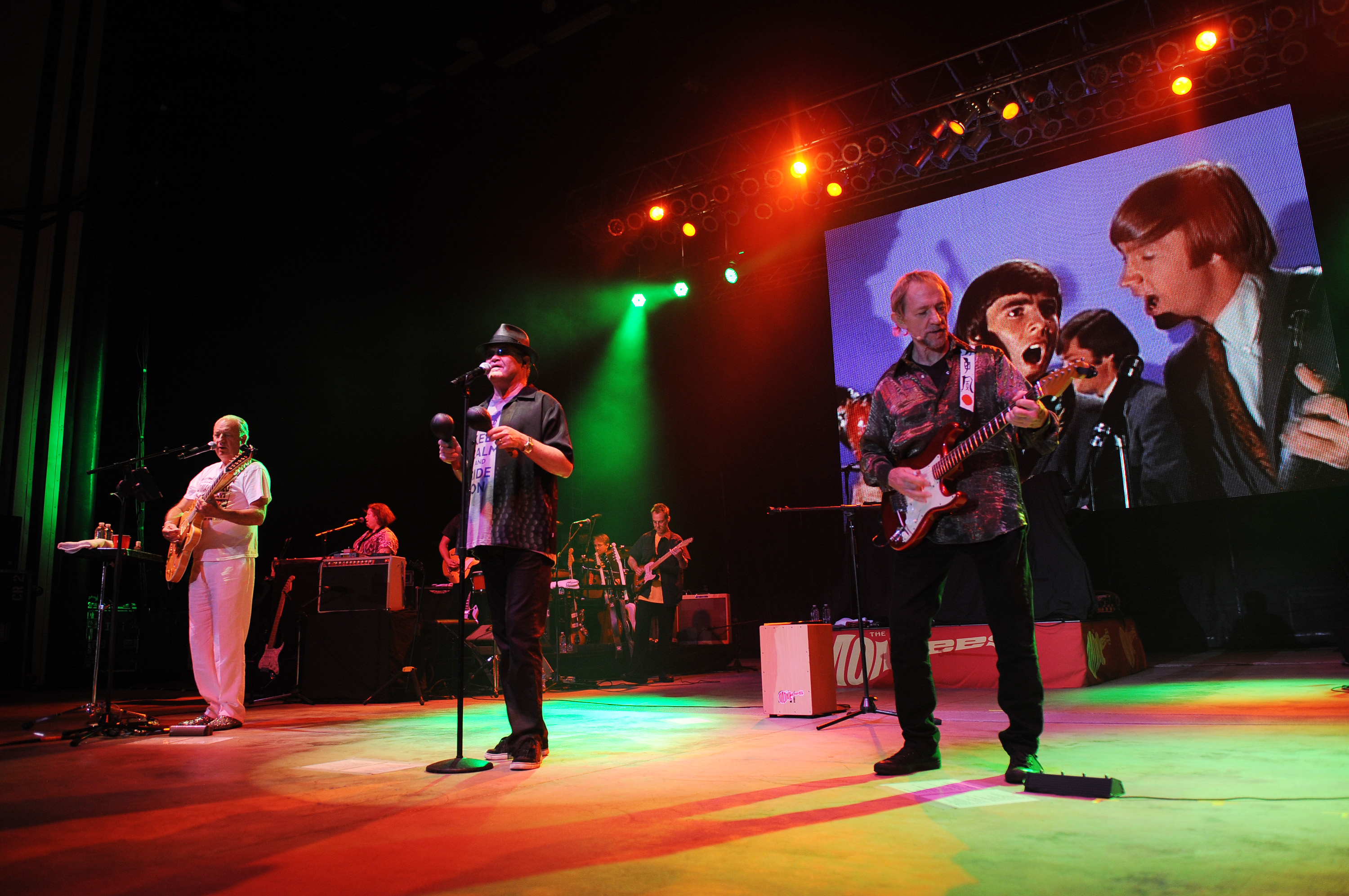 Michael Nesmith, Micky Dolenz and Peter Tork of The Monkees perform during the Mid Summers Night Tour at the Mizner Park Amphitheater, July 27, 2013 in Boca Raton, Fla. (Jeff Daly—Invision/AP)