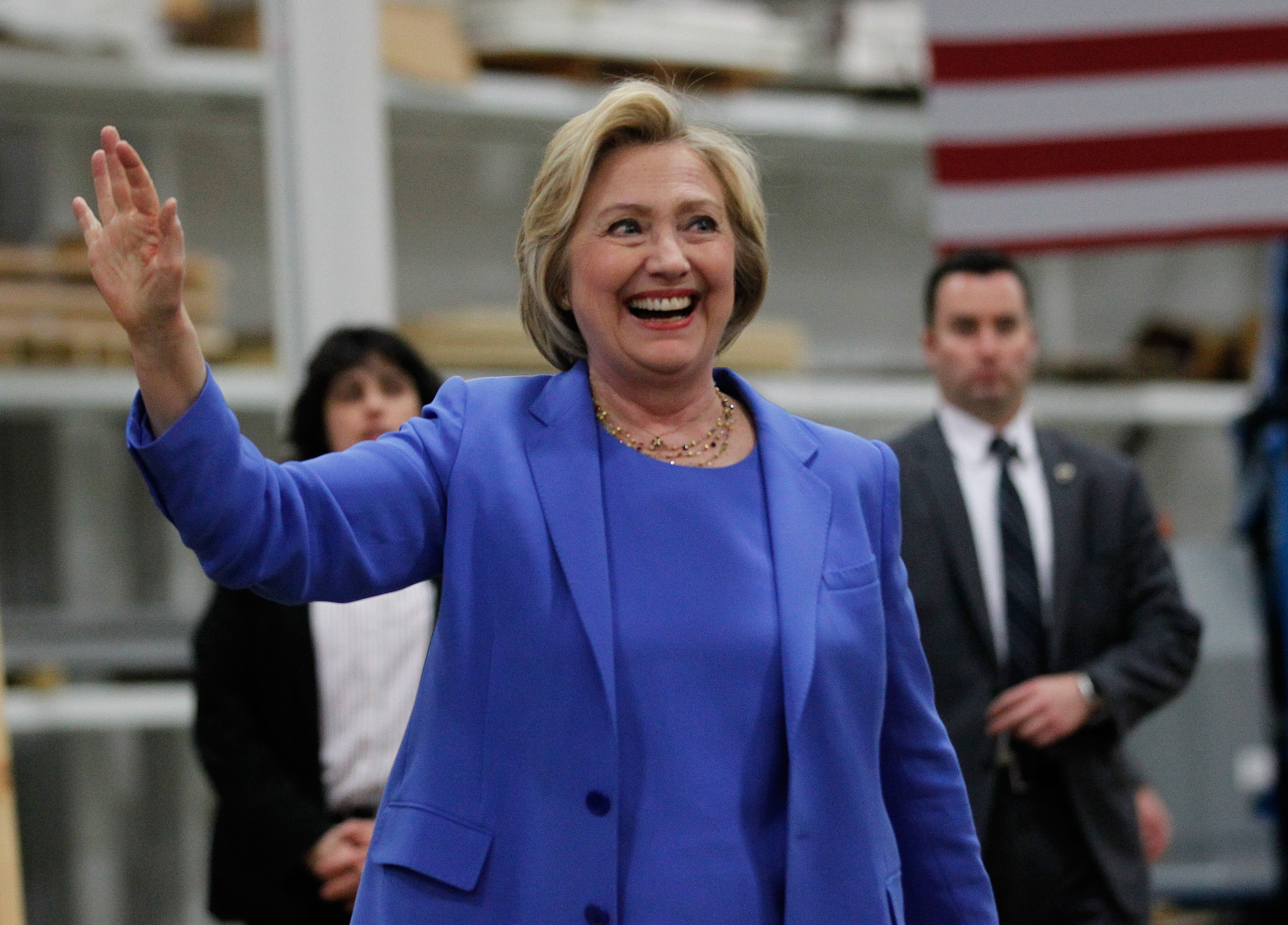Democratic presidential candidate Hillary Clinton waves to the crowd during a campaign stop at the Union of Carpenters and Millwrights Training Center on May 15 in Louisville, Kentucky. (John Sommers II/Getty Images)