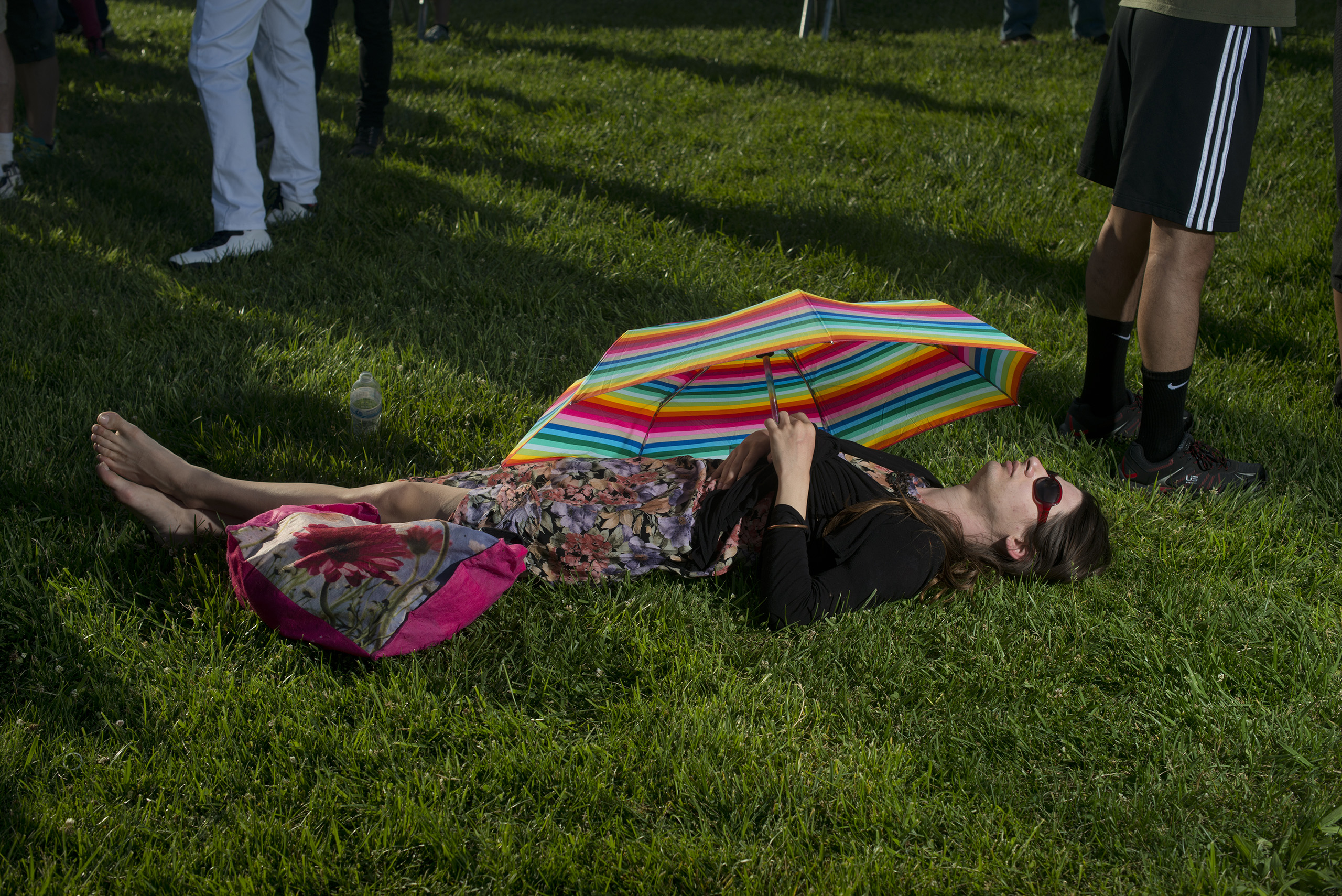 A woman sunbathes at a Bernie Sanders campaign rally at Waterfront Park in Vallejo, Calif., May 18, 2016.