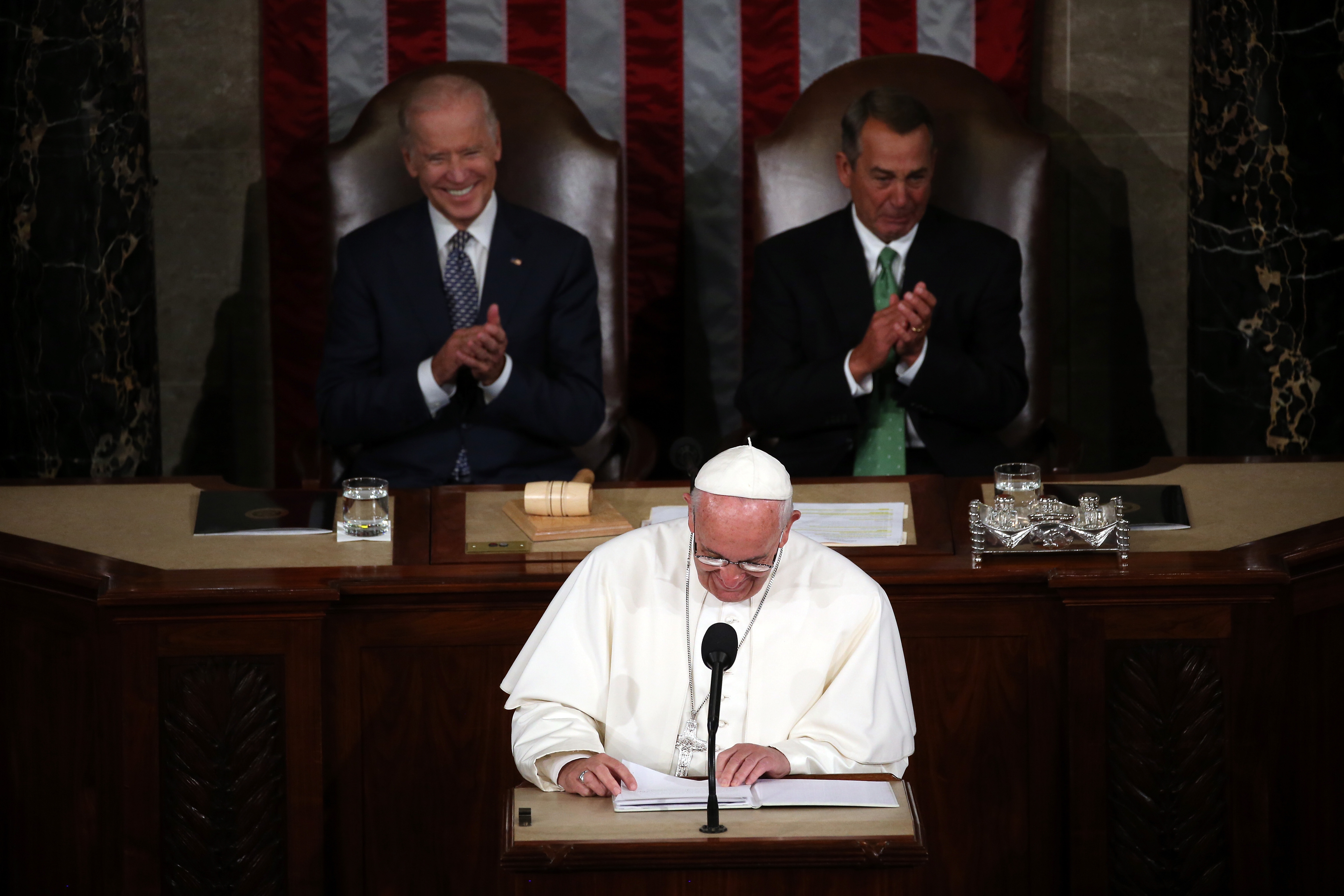 Pope Francis addresses a joint meeting of the U.S. Congress with with Vice President Joe Biden (L) and Speaker of the House John Boehner (R-OH) in the House Chamber of the U.S. Capitol in Washington, D.C., on Sept. 24, 2015. (Mark Wilson—Getty Images)