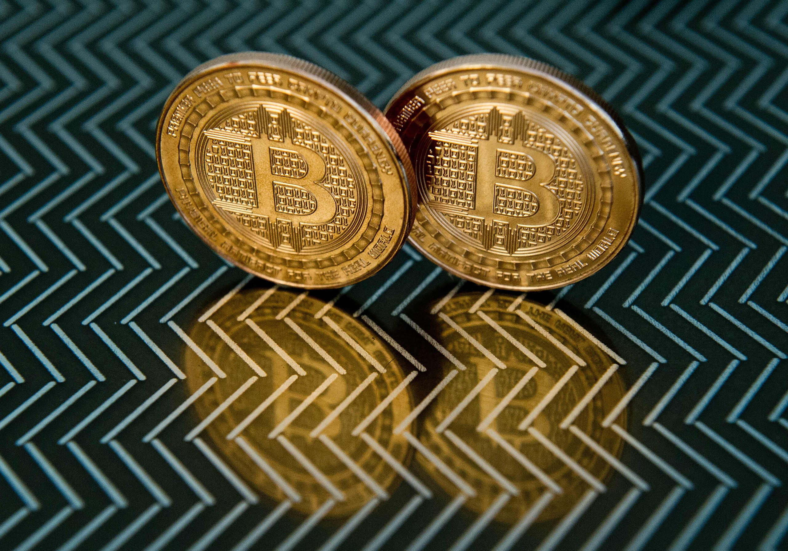 Bitcoin medals are seen in Washington, June 17, 2014. On May 2, an Australian entrepreneur, identified as Craig Wright, revealed himself as the creator following years of speculation about who invented the pioneering digital currency. (Karen Bleier—AFP/Getty Images)