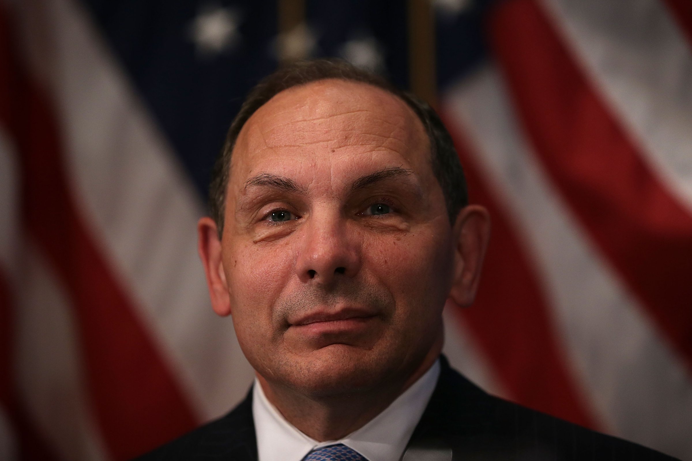 U.S. Secretary of Veterans Affairs Robert McDonald waits to be introduced prior to his address to a Newsmaker Luncheon at the National Press Club November 6, 2015 in Washington, DC.