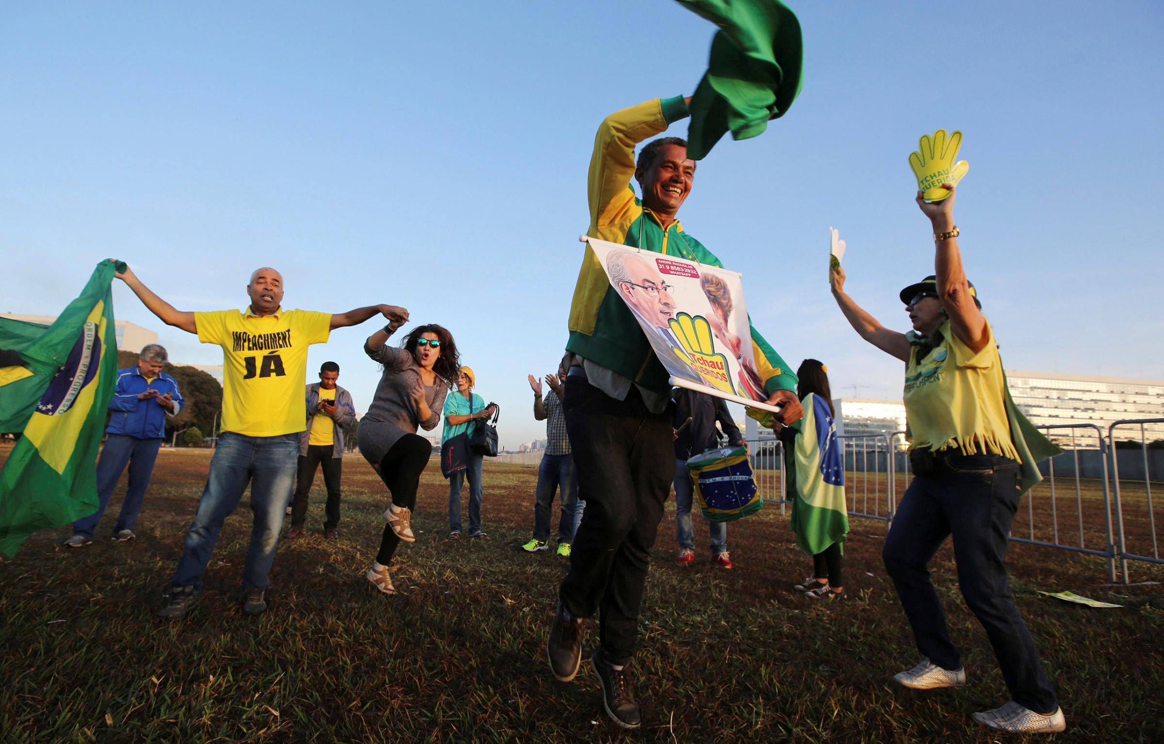Demonstrators who support Brazil's President Dilma Rousseff's impeachment react in Brasilia, Brazil, May 12, 2016.