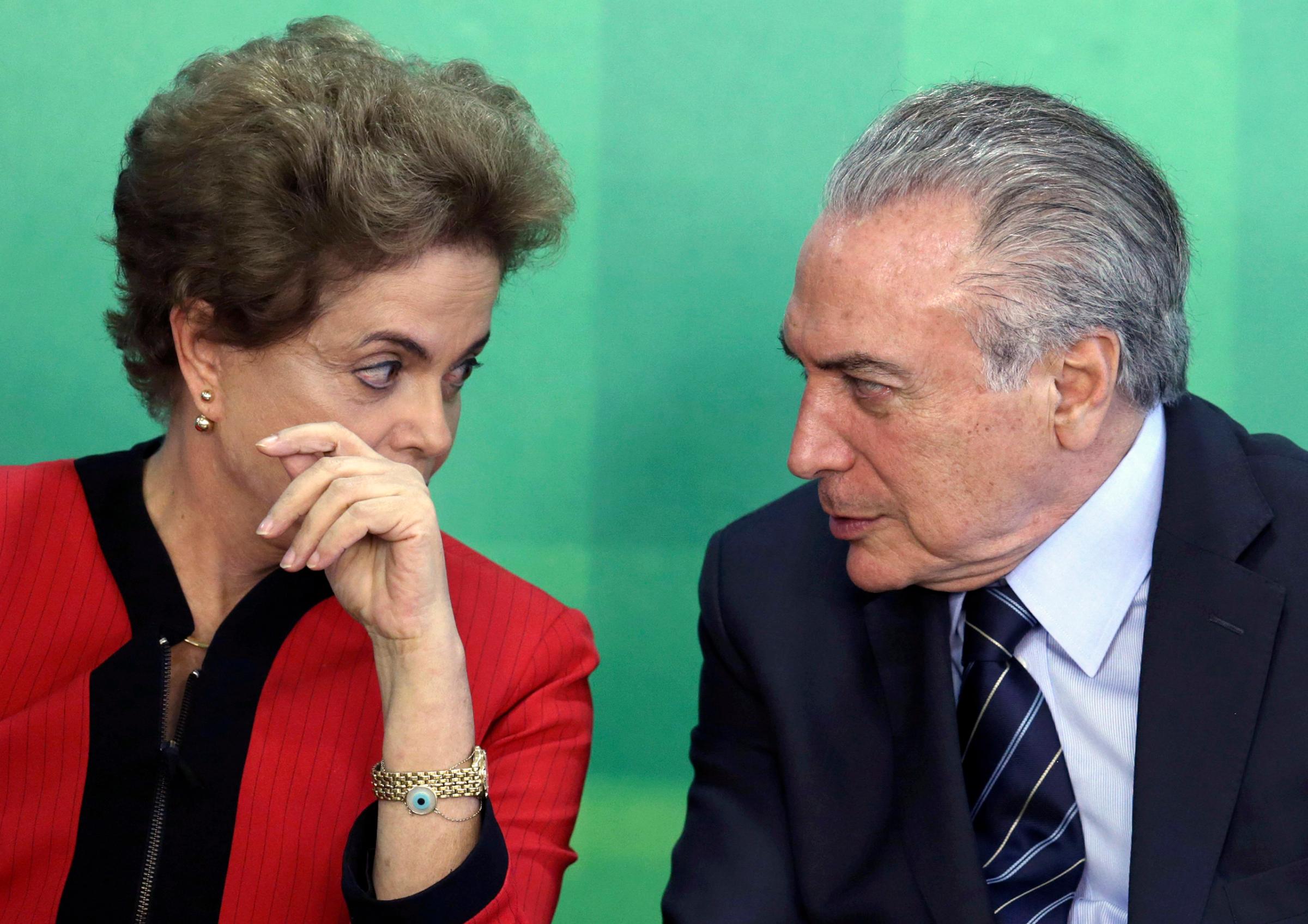 Brazilian President Dilma Rousseff talks with Vice President Michel Temer at Planalto presidential palace in Brasilia, March 2, 2016.