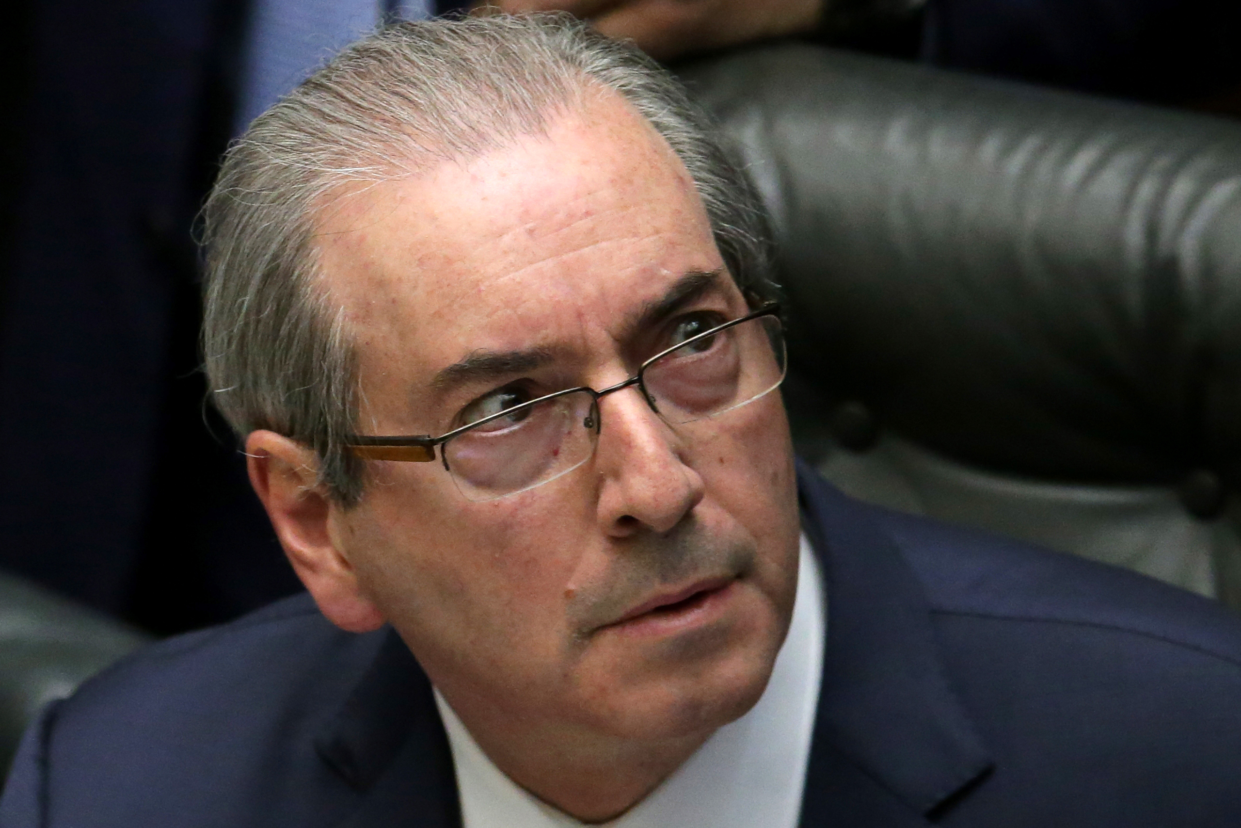 FILE - In this April 15, 2016 file photo, House Speaker Eduardo Cunha attends a debate on whether or not to impeach the president, at the Chamber of Deputies in Brasilia, Brazil. A justice on Brazil’s supreme court suspended Cunha, which temporarily removes him. He’s been leading the effort to impeach President Dilma Rousseff but himself faces a long list of corruption allegations and is accused by Brazil’s chief-prosecutor of obstructing justice. (AP Photo/Eraldo Peres, File)
