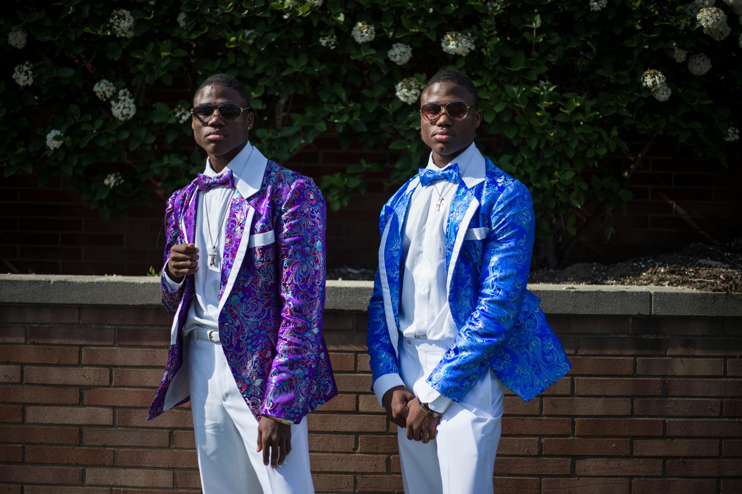 Antwoin and Antonio Nelson, both 18, of Flint, Mich., pose for a pre-prom picture outside Northwestern High School, May 21, 2016.