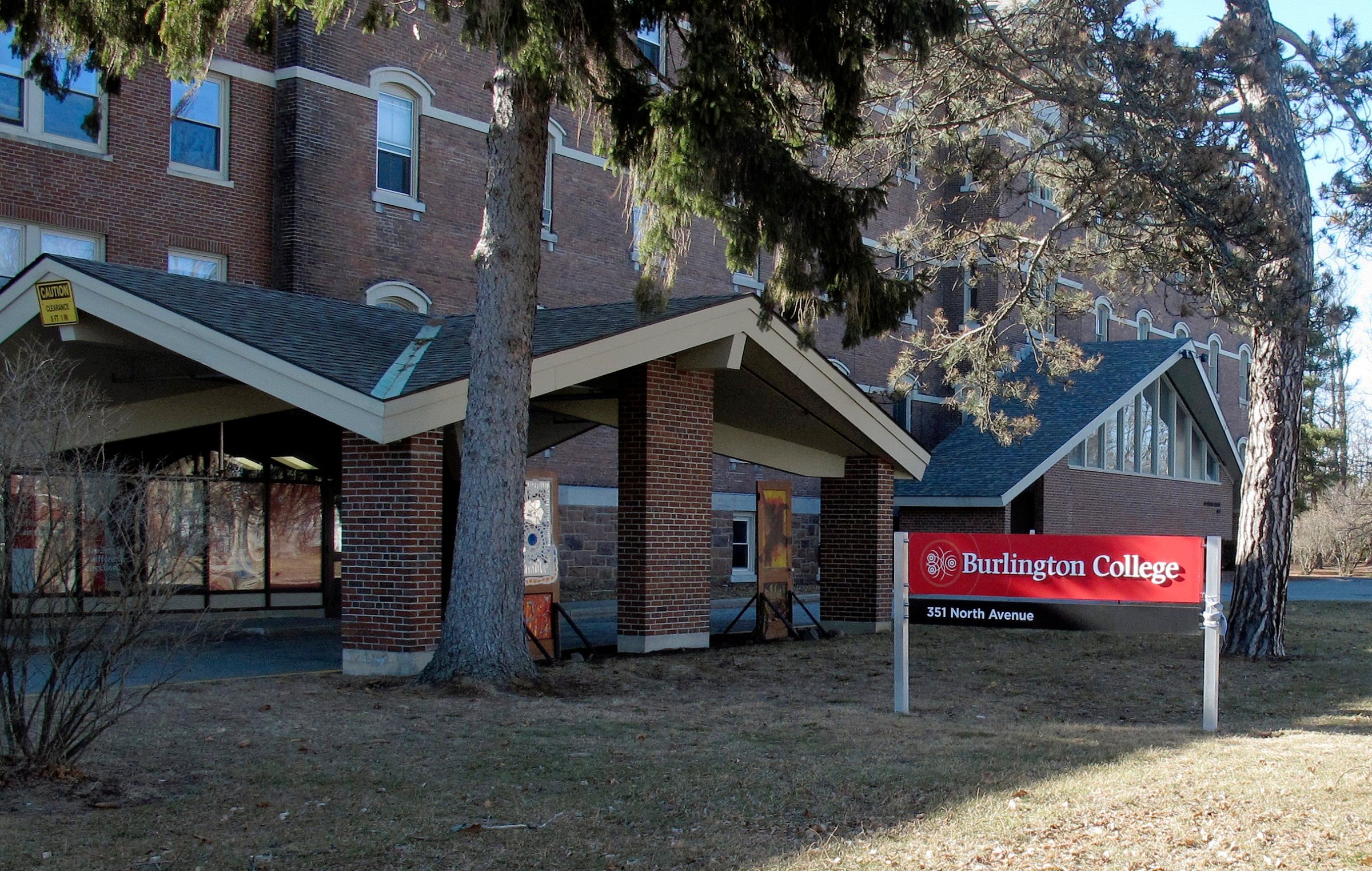 This Feb. 22, 2015 photo shows a building on the campus of Burlington College in Burlington, Vt. The college, formerly headed by Jane Sanders, wife of presidential candidate Bernie Sanders, announced Monday, May 16, 2016, it is closing. The school has been struggling under the weight of its $10 million purchase of property and buildings during from the Roman Catholic Diocese of Burlington that it made during her presidency. (AP Photo/Wilson Ring)