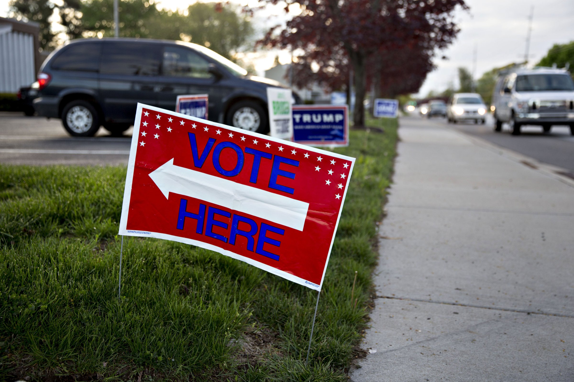 A "Vote Here" sign stands outside a polling station during the presidential primary vote in South Bend, Indiana, U.S., on Tuesday, May 3, 2016.