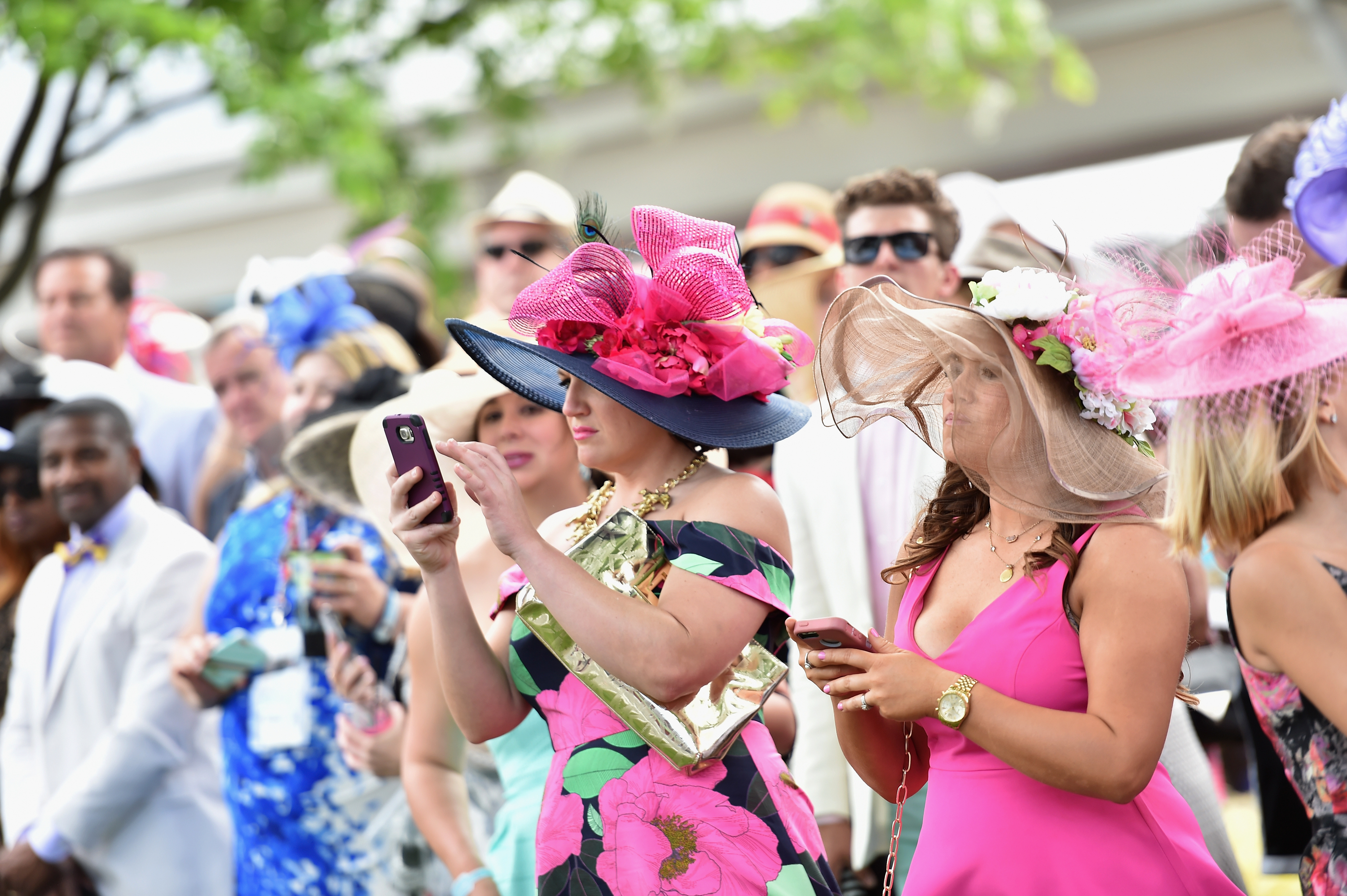 Women with hats during the 142nd running of the Kentucky Oaks horse race at Churchill Downs on May 7, 2016, in Louisville, Ky.