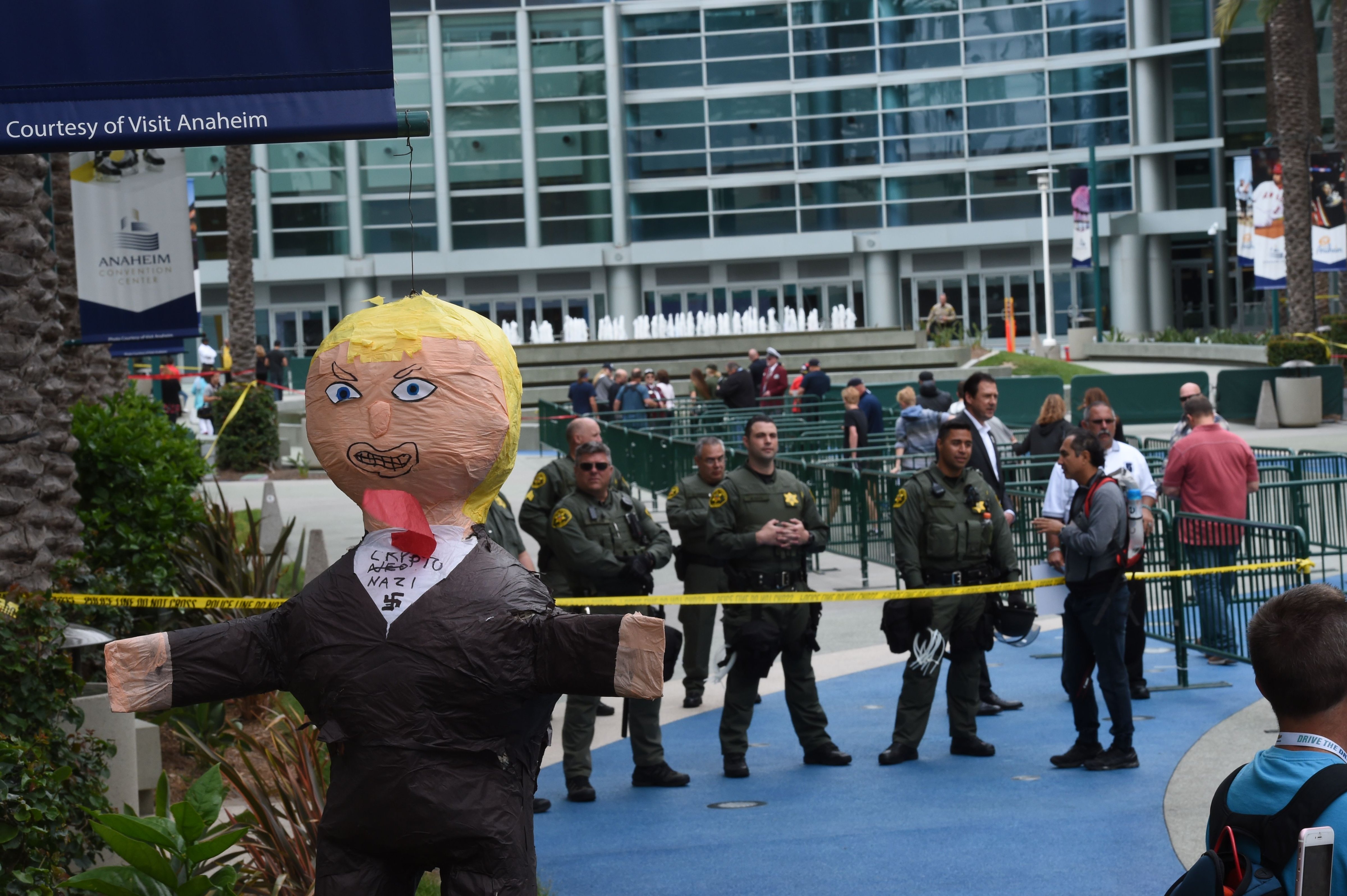 People gather outside the Anaheim Convention Center before Republican presidential candidate Donald Trump speaks on May 25, in Anaheim, California. (Mark Ralston—AFP/Getty Images)