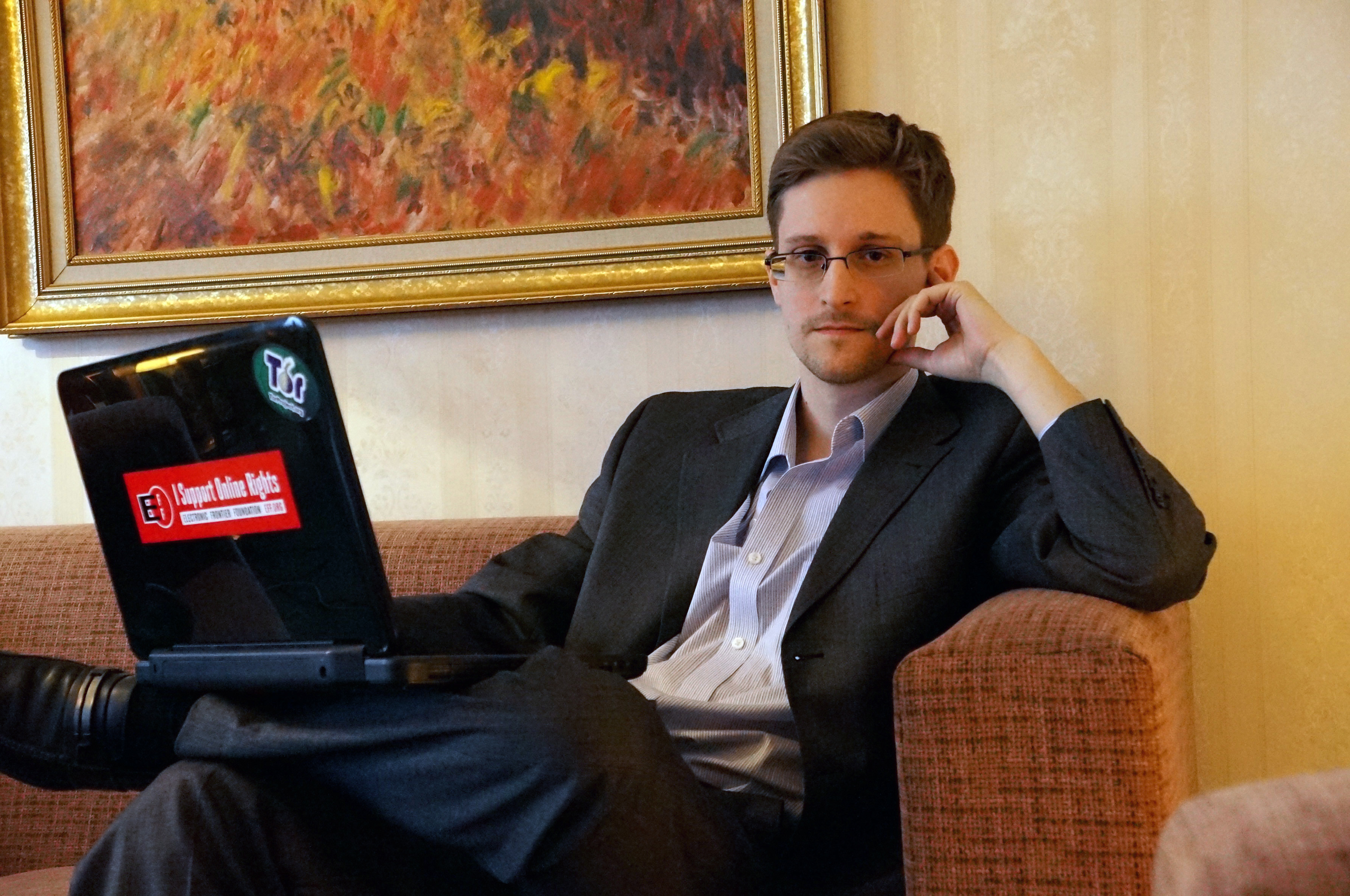 Former intelligence contractor Edward Snowden poses for a photo during an interview in an undisclosed location in December 2013 in Moscow, Russia. (Barton Gellman—Getty Images)