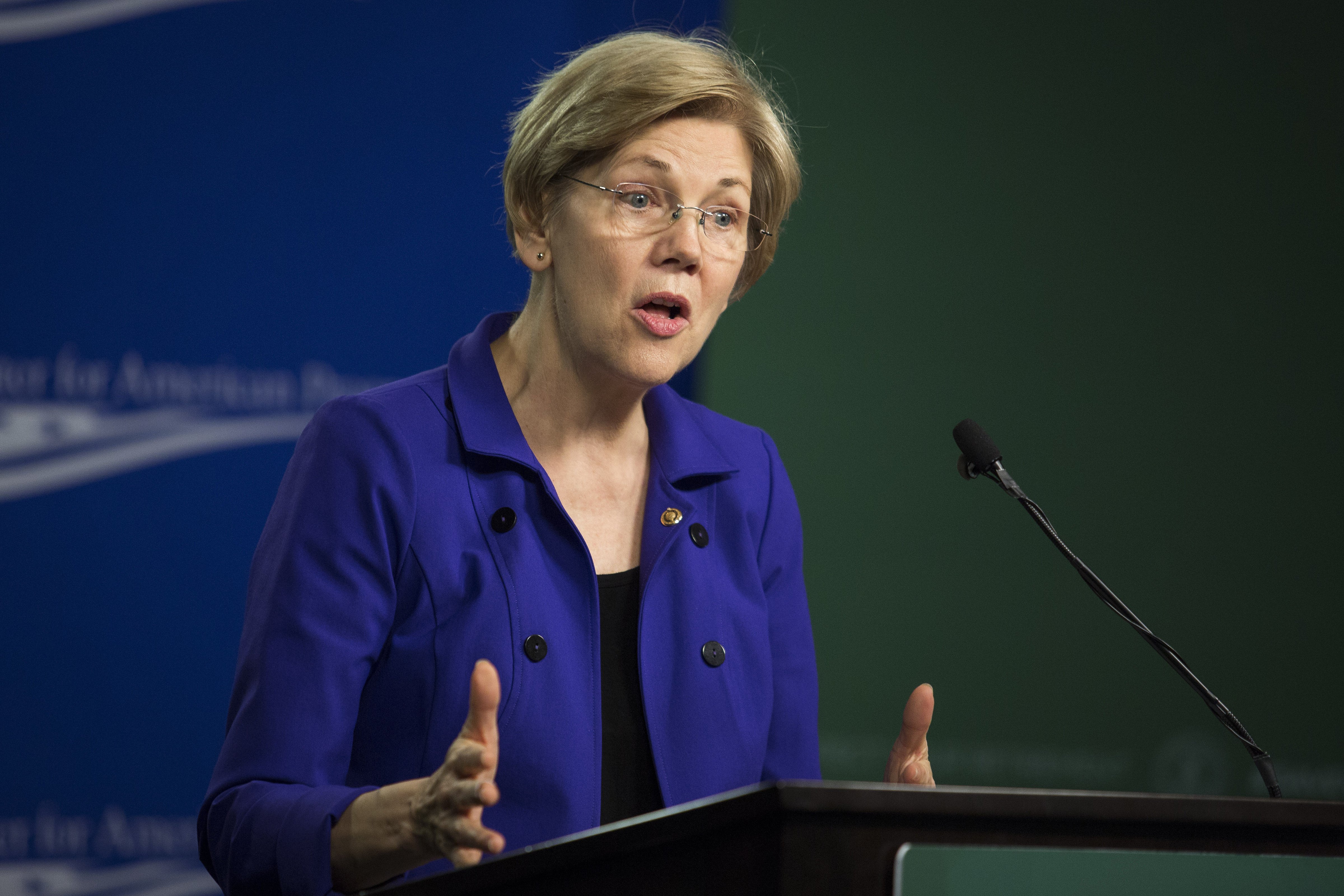 Senator Elizabeth Warren, a Democrat from Massachusetts, speaks during a U.S. Labor Department news conference at the Center for American Progress in Washington on April 6, 2016. (Drew Angerer—Bloomberg/Getty Images)