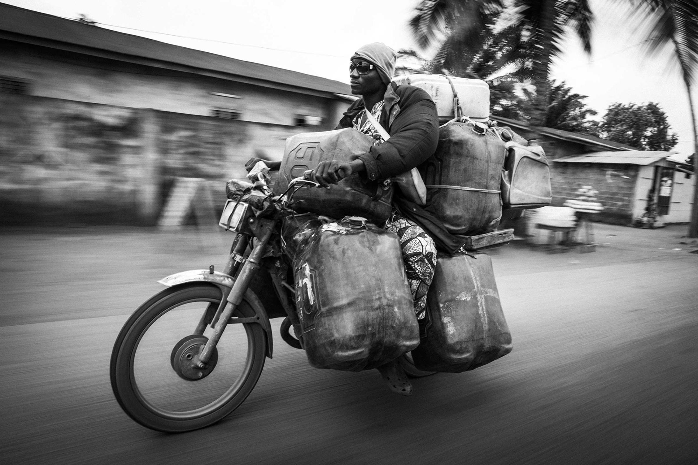 The 100cc motorbike is the transport par excellence in the county. The illegal drivers employ them to travel around all Benin loaded with tens of litres of fuel. The most common model of motorbike is the BOXER and HONDA.