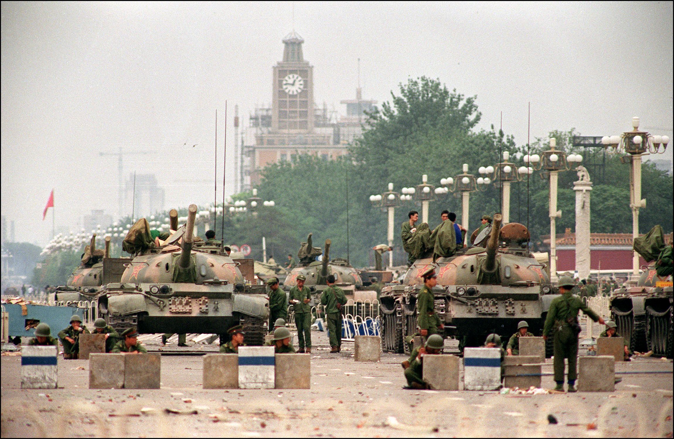 The People's Liberation Army  (PLA) tanks guard a strategic Chang'an Avenue leading to Tiananmen Square June 6 1989. (Manuel Ceneta—AFP/Getty Images)