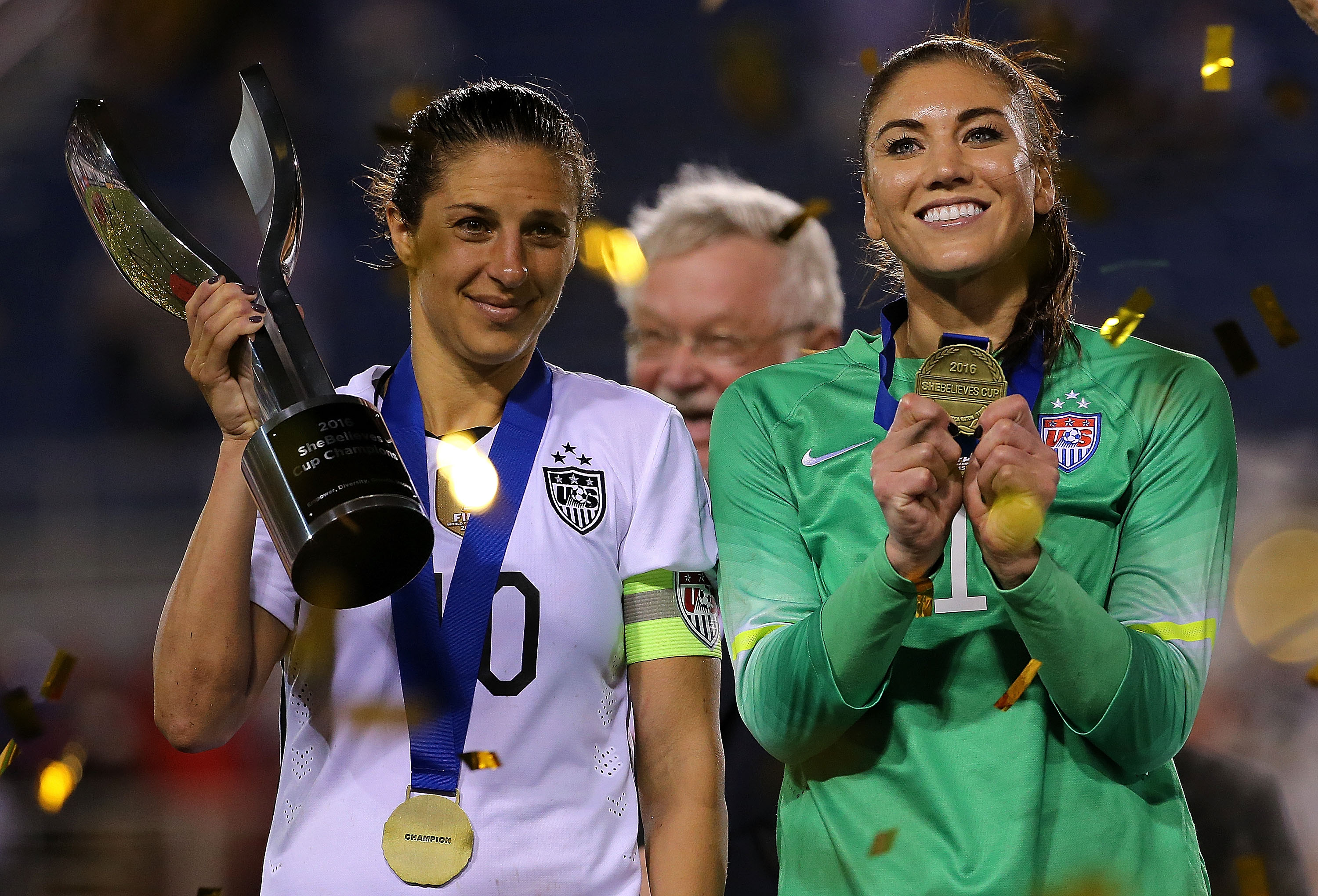Hope Solo #1 and Carli Lloyd #10 of the United States celebrate after winning a match against Germany in the 2016 SheBelieves Cup on March 9, 2016 in Boca Raton, Fla. (Mike Ehrmann—Getty Images)
