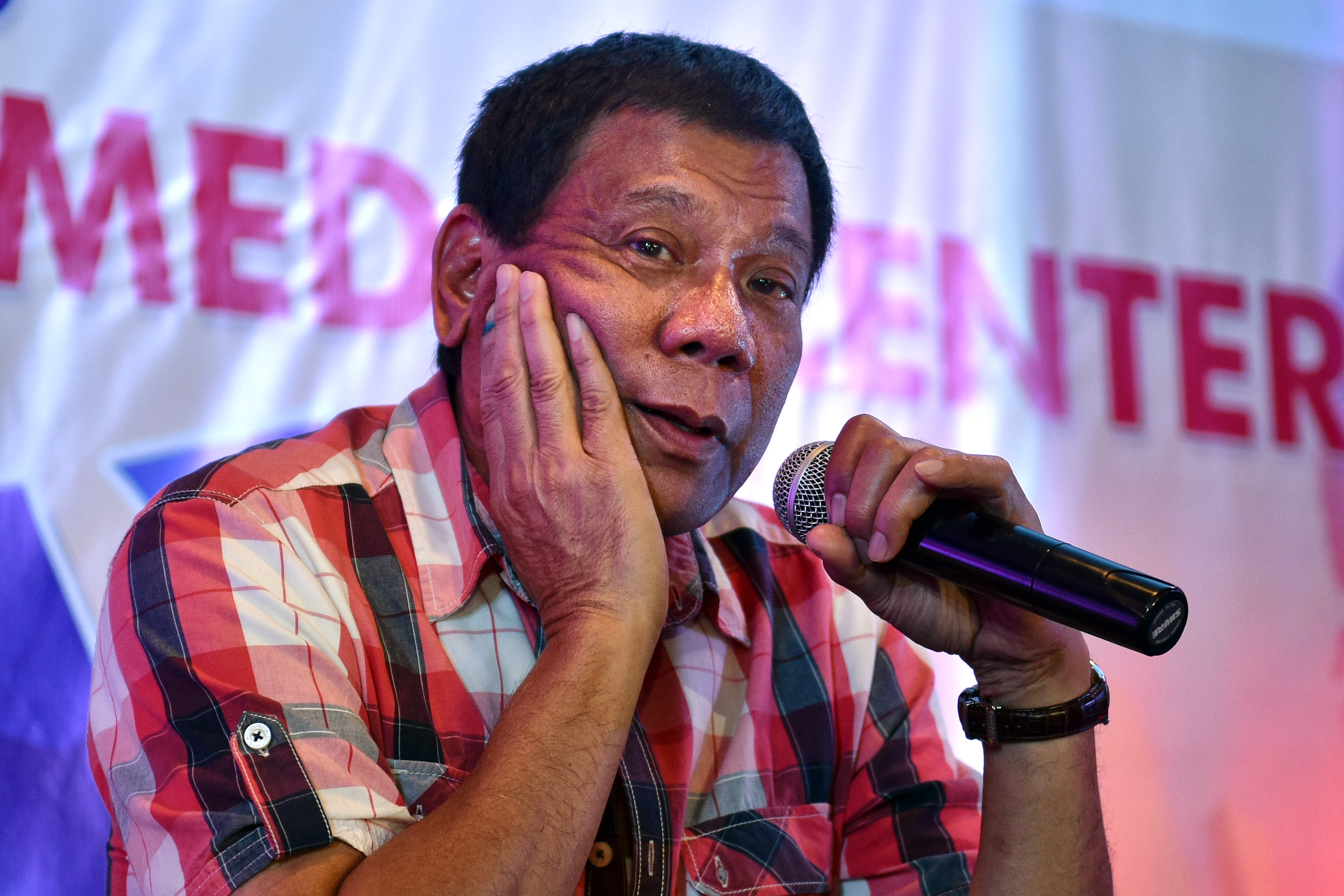 Rodrigo Duterte answers questions from journalists during a press conference on May 10, 2016, in Davao City, the Philippines (Jes Aznar—Getty Images)