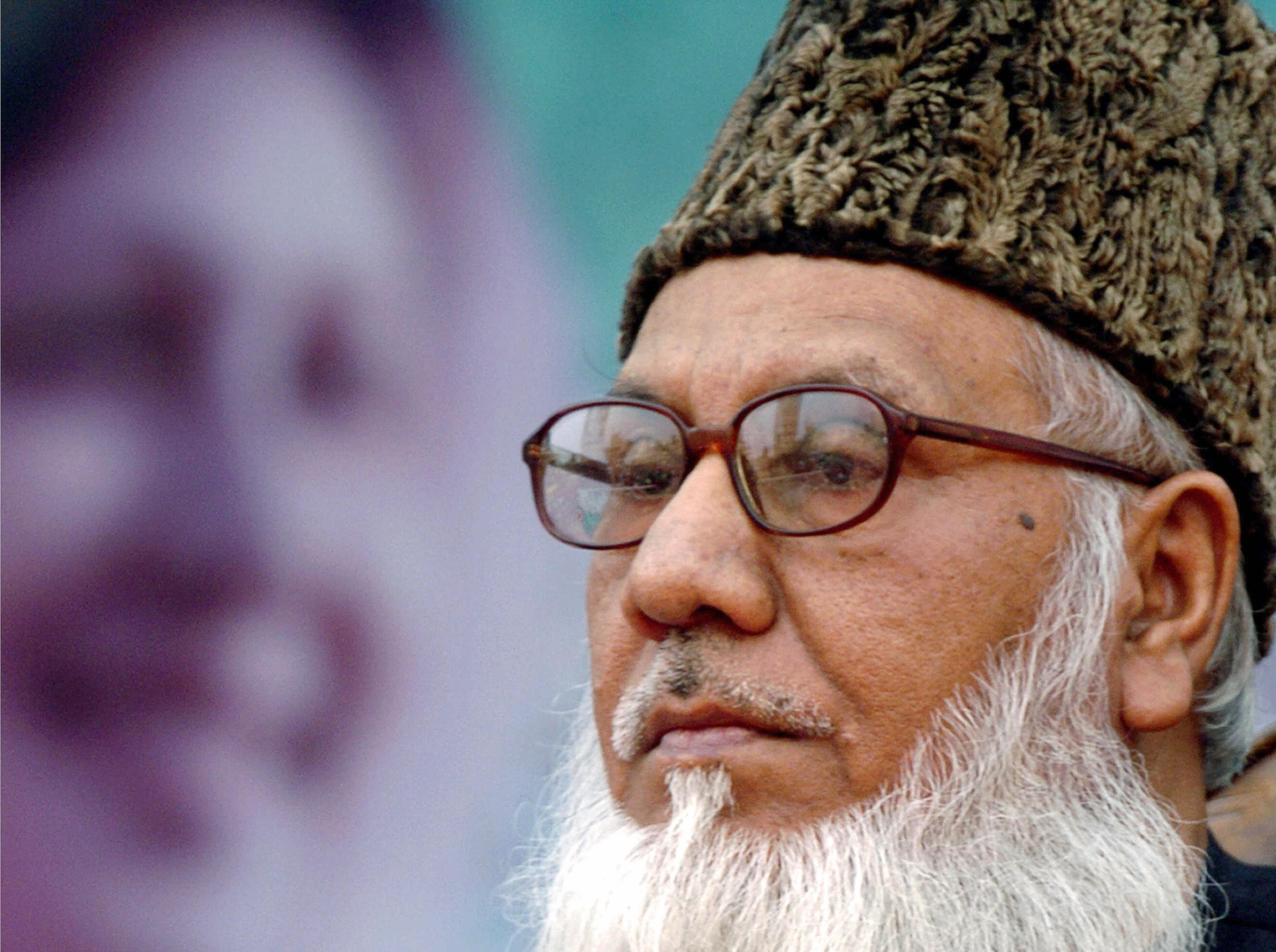 Former industries minister and leader of the Jamaat-e-Islami Islamic party in Bangladesh Motiur Rahman Nizami as he during a rally in Dhaka, Dec. 12, 2006 (Farjana Khan Godhuly—AFP/Getty Images)