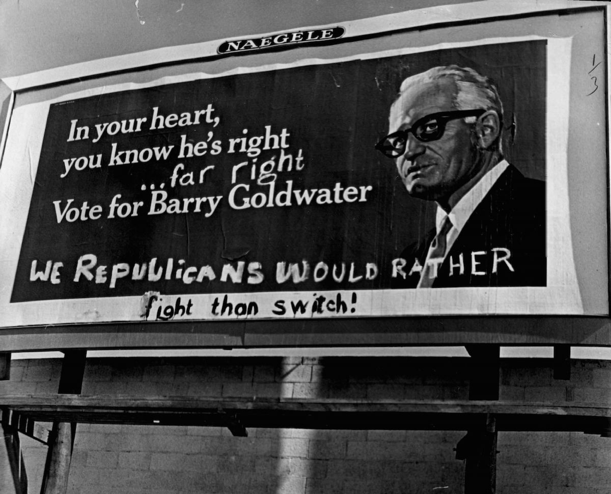 Partisans of both parties were at work on 1964 Barry Goldwater billboard in Denver (Duane Howell—Denver Post / Getty Images)