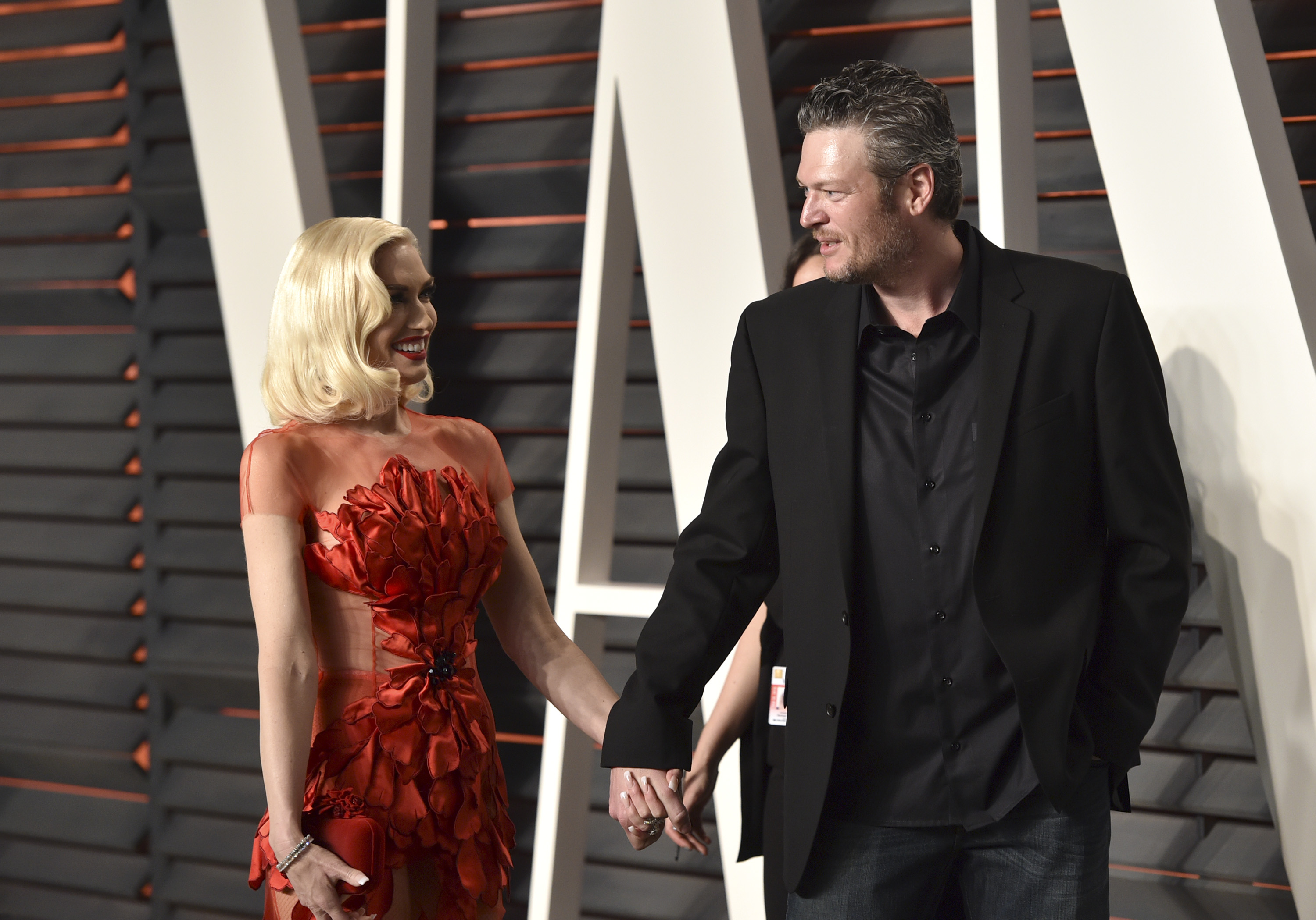 Recording artists Gwen Stefani (L) and Blake Shelton arrive at the 2016 Vanity Fair Oscar Party on Feb.  28, in Beverly Hills, California. (John Shearer/Getty Images)