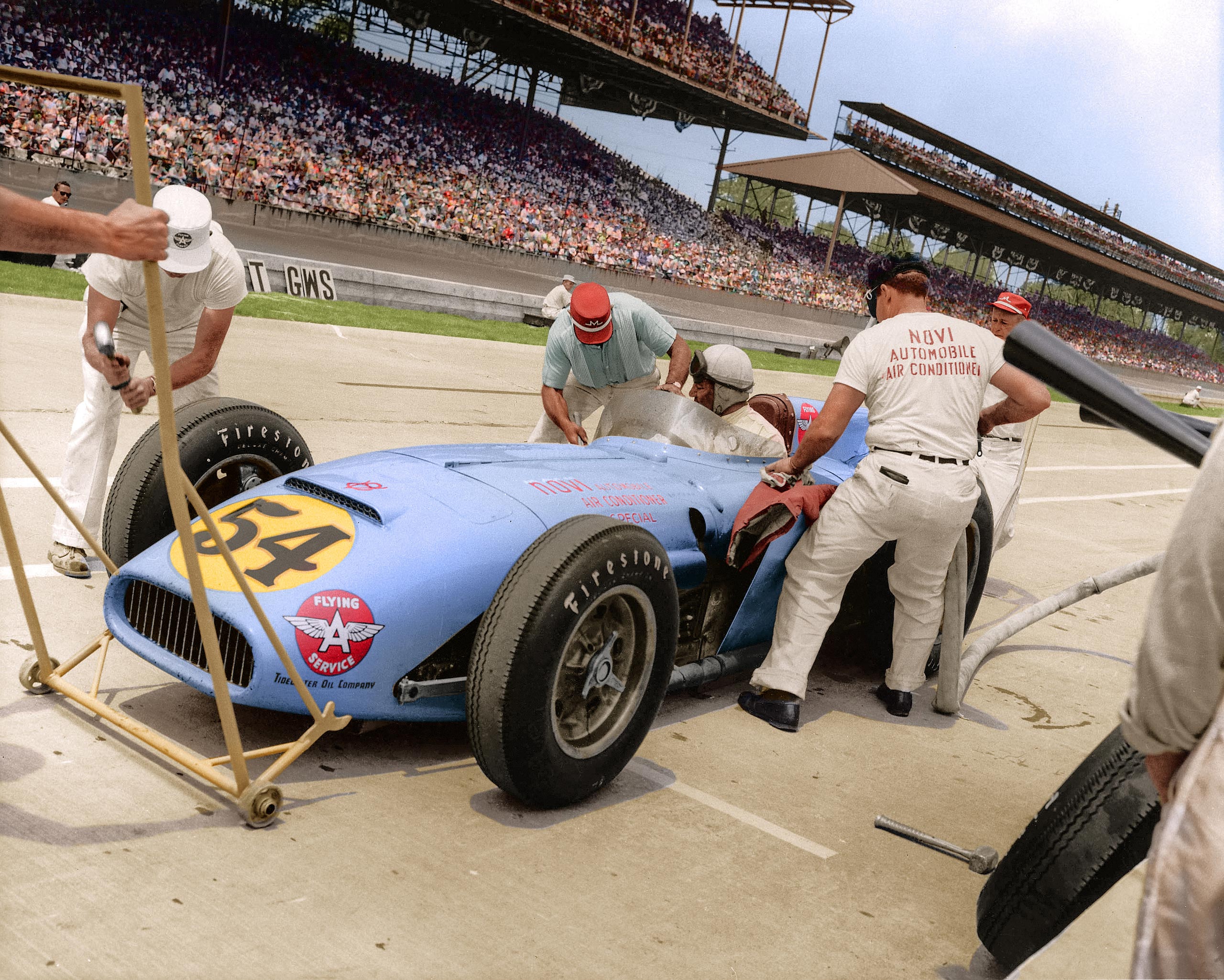 Duke Nalon makes a pit stop during the running of the Indianapolis 500 Indy Car race at Indianapolis Motor Speedway on May 30, 1948. Driving a 1947 Kurtis/Offenhauser owned by Lou Welch, Nalon finished third in the event.