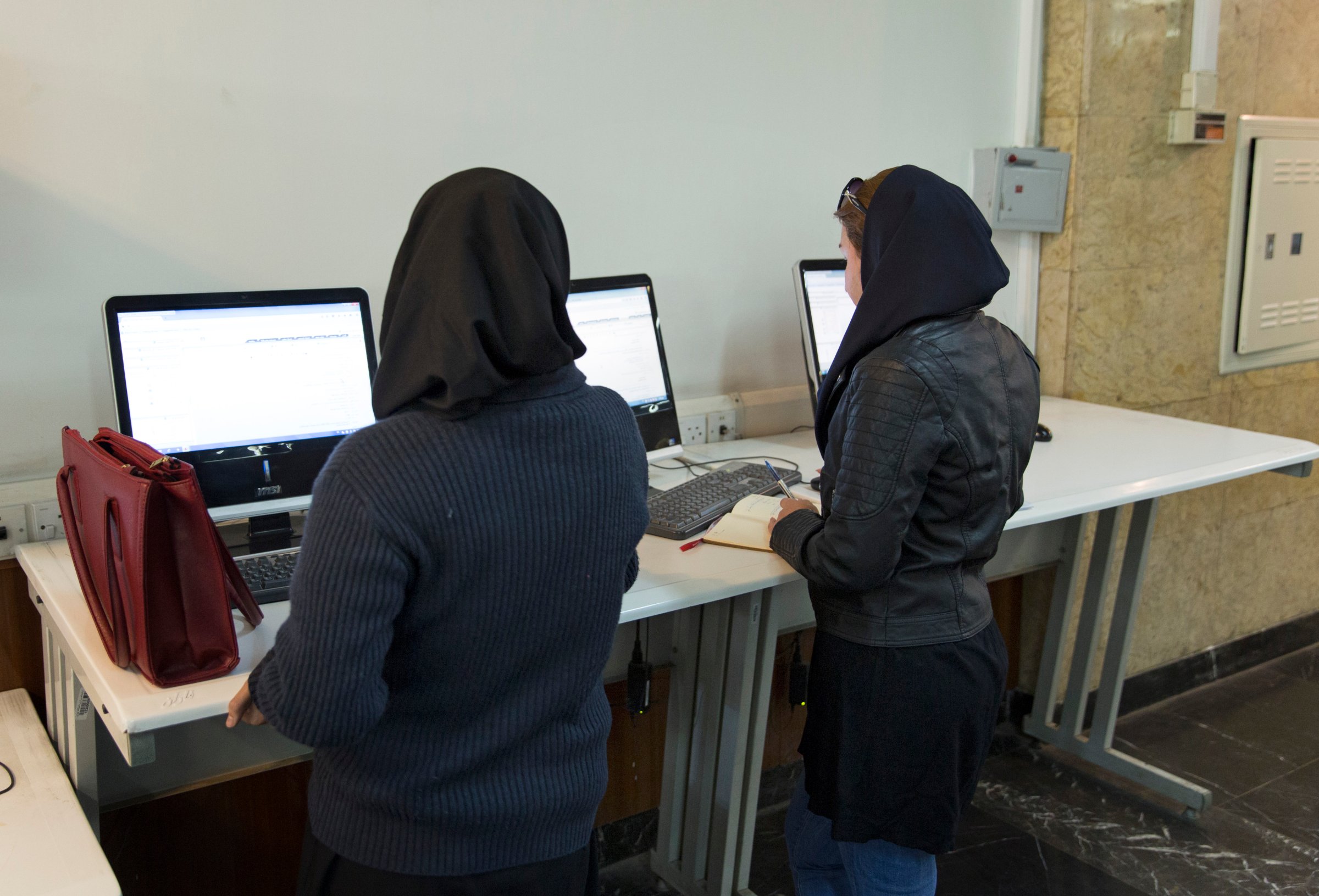 Students work with computers at Teheran University on October 18, 2015 in Teheran, Iran.