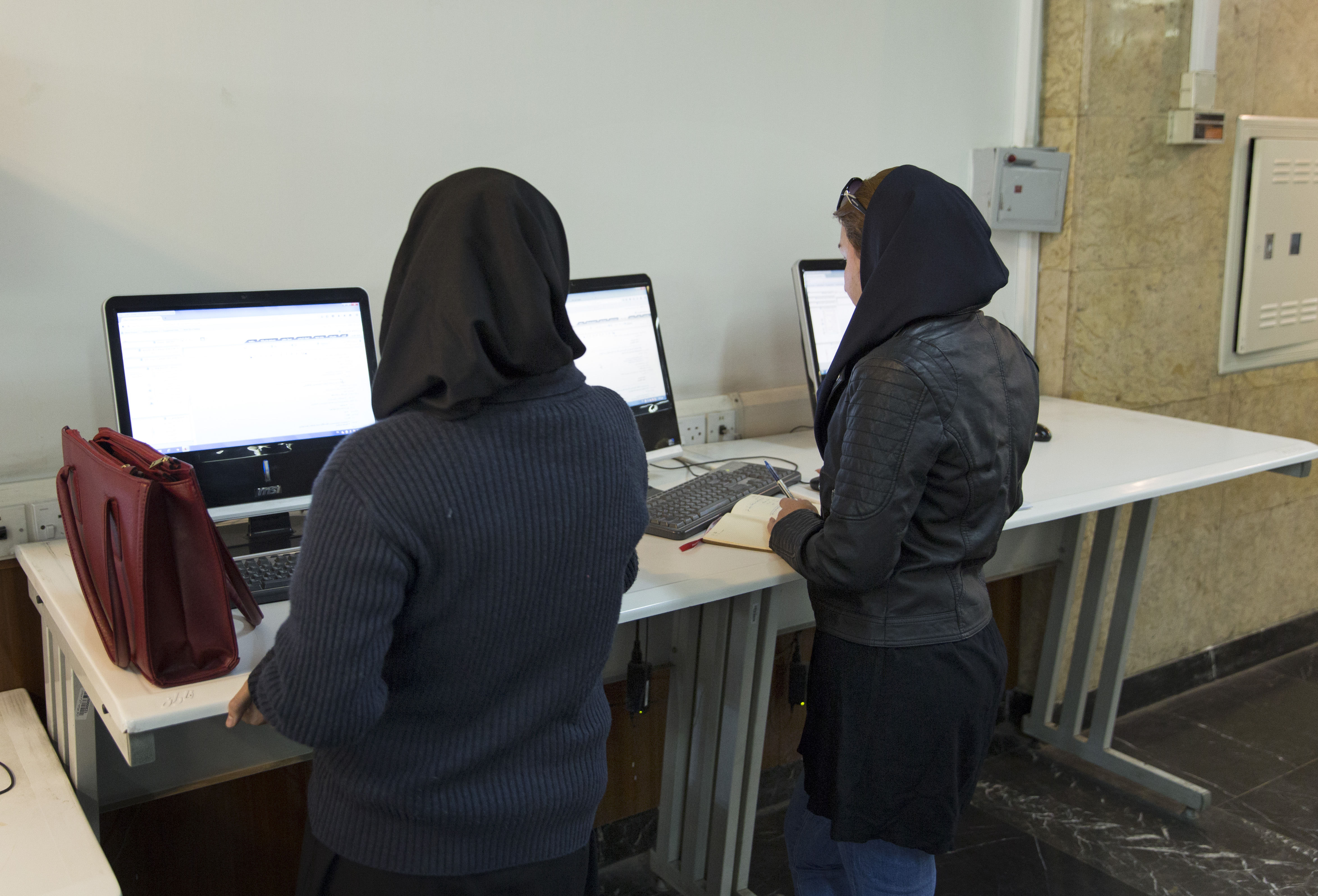 Students work with computers at Teheran University on October 18, 2015 in Teheran, Iran. (Thomas Koehler—Photothek/Getty Images)