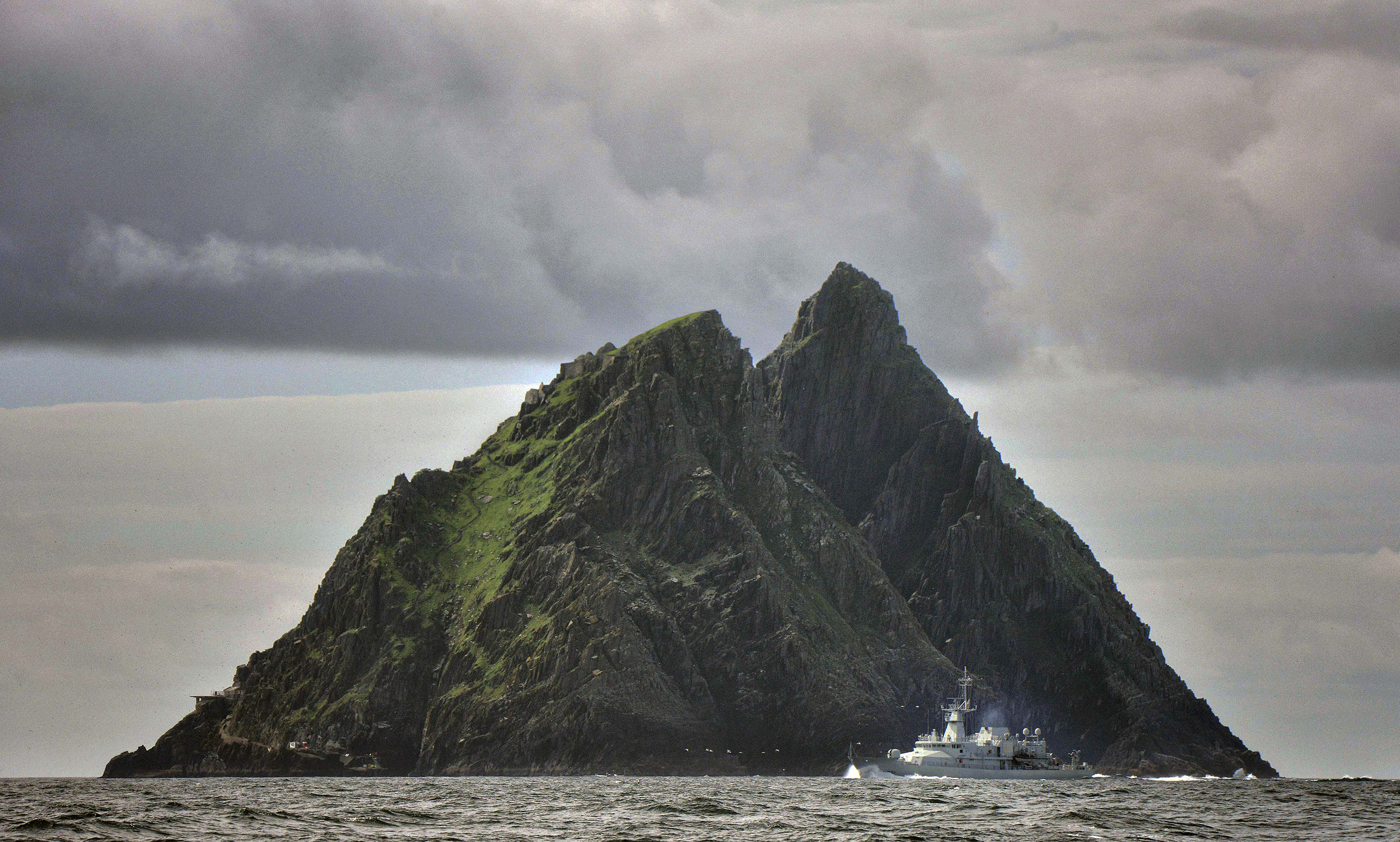 An Irish navy ship patrols around Skellig Island, Ireland, where Star Wars Episode VII was filmed, July 28, 2014. (Charles McQuillan—GC Images/Getty Images)