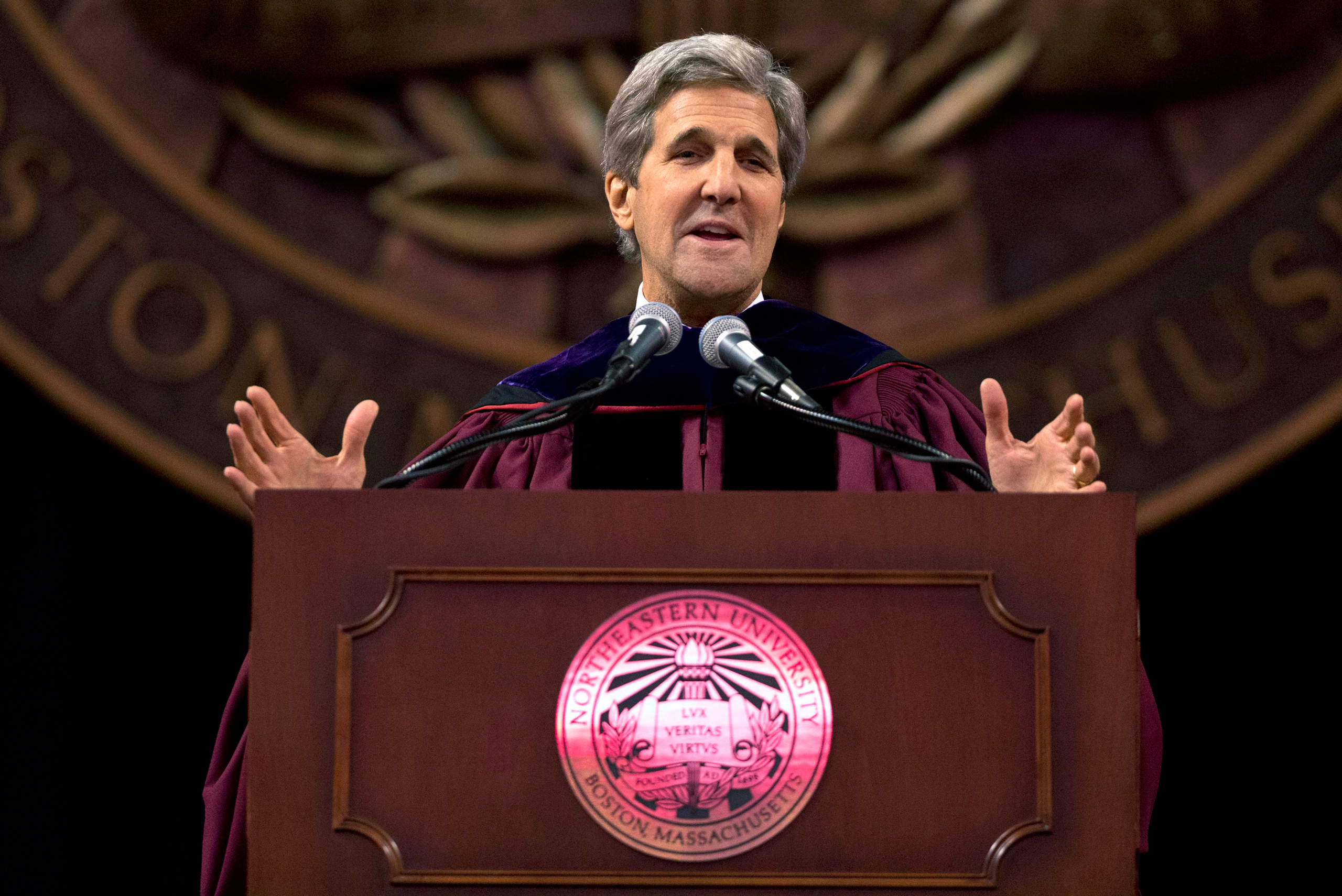 Secretary of State John Kerry gestures while giving the keynote address during Northeastern University's commencement ceremonies in Boston on May 6, 2016. (Michael Dwyer—AP)