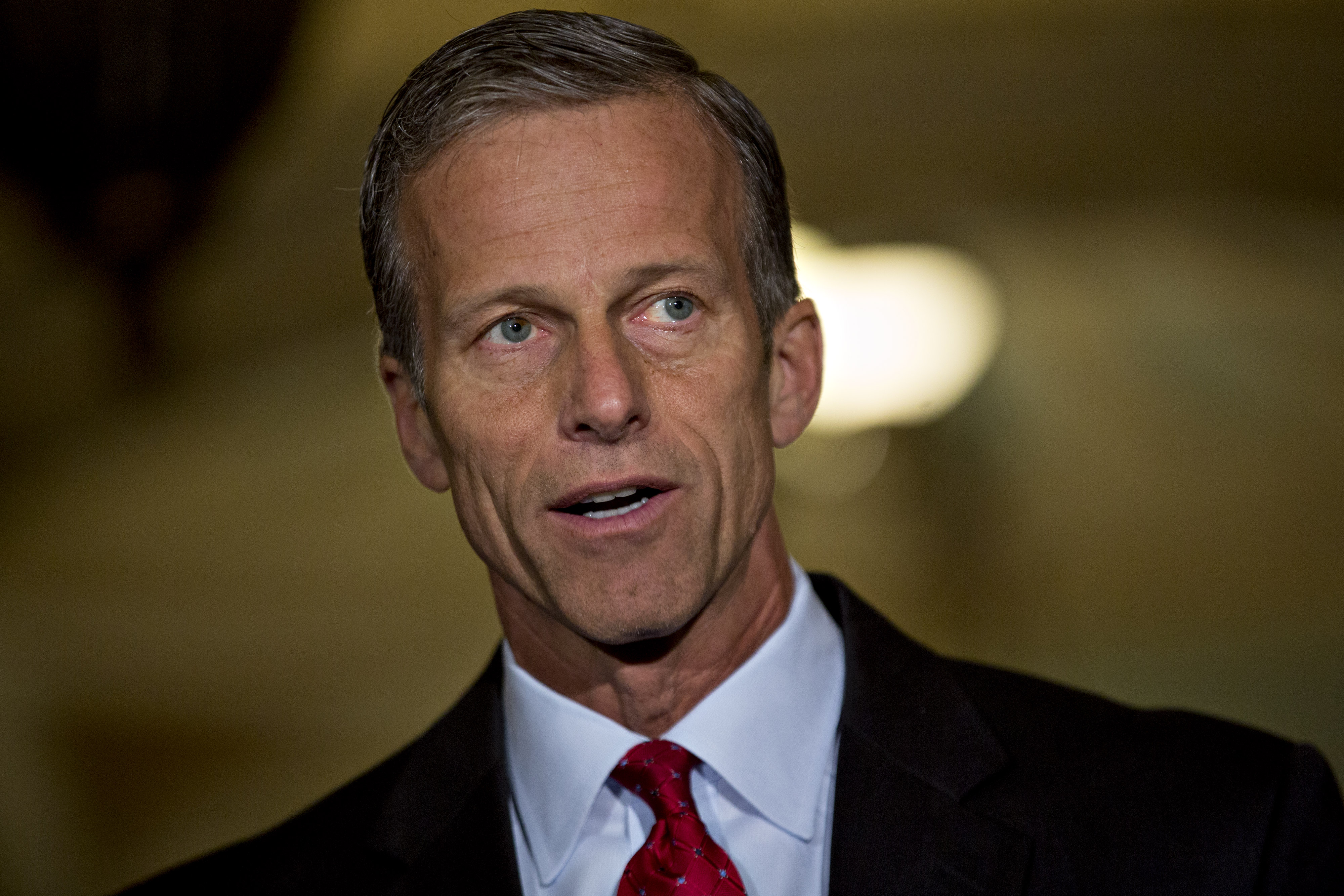 Sen. John Thune, a Republican from South Dakota, speaks to members of the media after a Senate luncheon meeting at the U.S. Capitol in Washington, D.C., on May 10. (Andrew Harrer—Bloomberg/Getty Images)