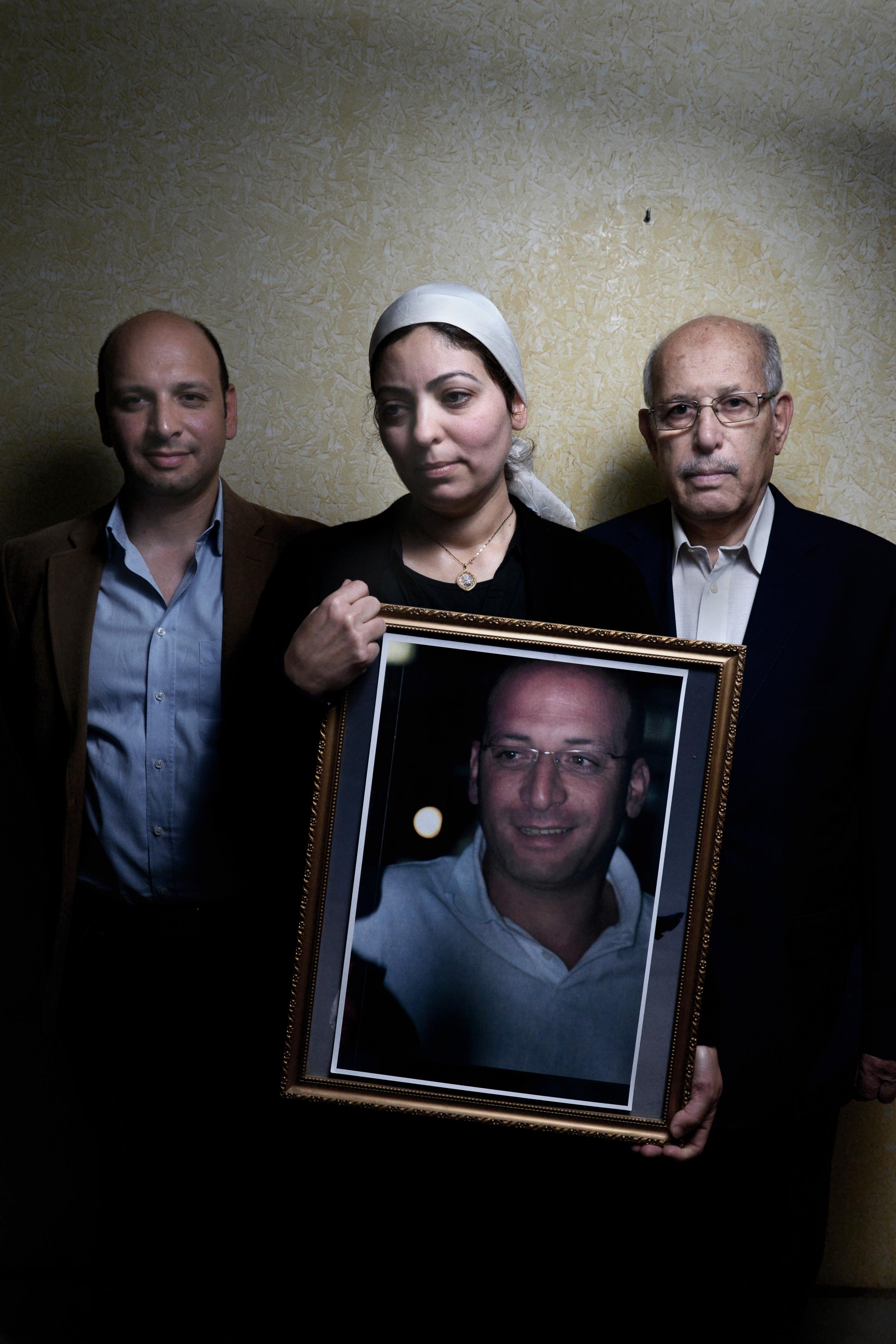Hazem Helal, Eman Samy and Mohamed Helal, the brother, wife and father of passenger Ahmed Helal