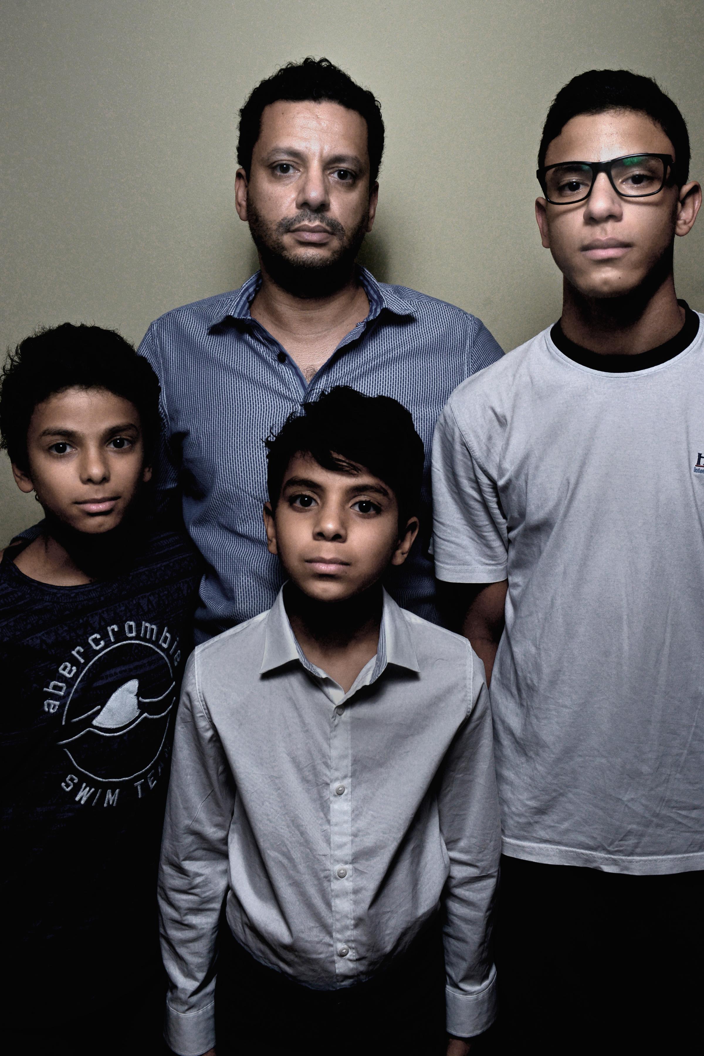 Takreem Mortada, husband of passenger Marwa Hamdy, and their children Ali, Mohamed and Ahmed
