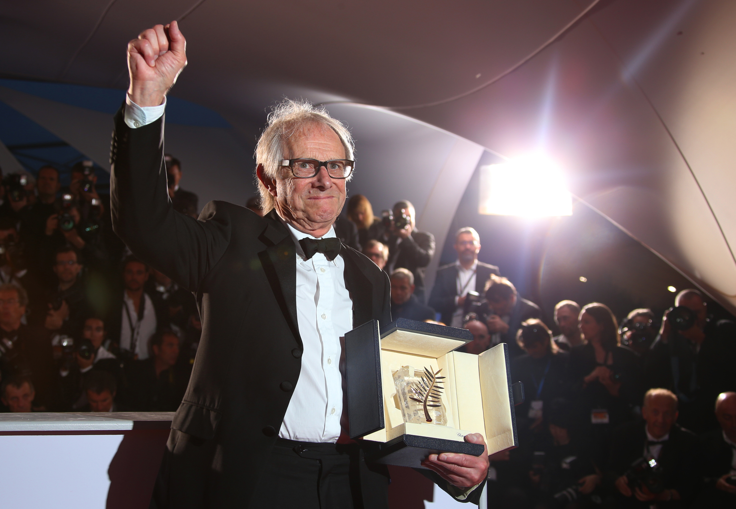 Director Ken Loach poses for photographers with the Palme d'Or for his film I, Daniel Blake during the photo call following the awards ceremony at the 69th international film festival, Cannes, France, on May 22, 2016. (Joel Ryan—AP)