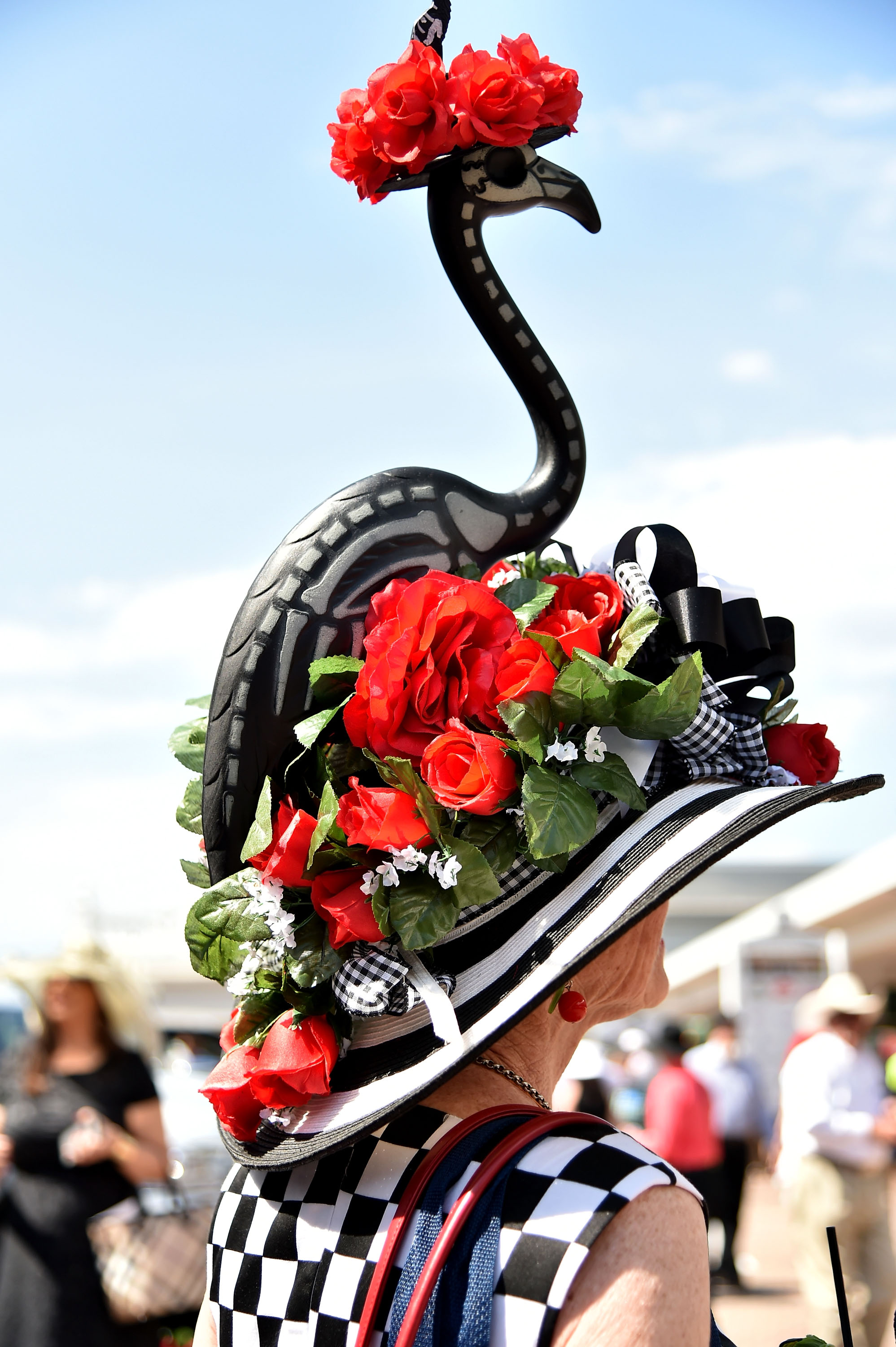 Woman with a hat during the 142nd running of the Kentucky Oaks horse race at Churchill Downs on May 7, 2016, in Louisville, Ky.