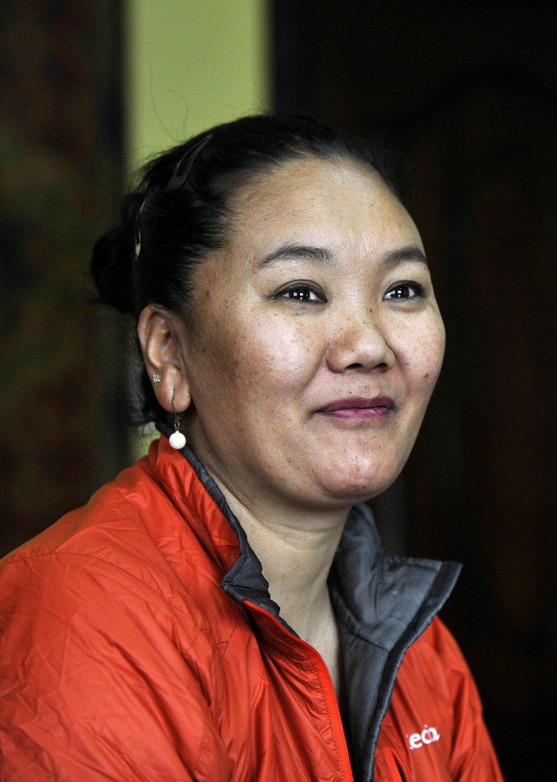 In this photograph taken on April 13, 2016, Nepalese mountaineer Lakpa Sherpa prepares her equipment during an interview with AFP in Kathmandu. The daughter of a yak herder, Lhakpa Sherpa worked as a porter and kitchen hand on trekking and mountaineering expeditions when she was young, before climbing solo. Generations of men from Nepal's famed Sherpa community have climbed the Himalayas, while their wives and daughters have traditionally kept the home fires burning. But in a sign of changing times, a string of Sherpa women are now breaking records themselves, not only on 8,848-metre (29,029-foot) high Everest but other dangerous peaks. / AFP / PRAKASH MATHEMA / TO GO WITH AFP STORY NEPAL-MOUNTAINEERING-GENDER-QUAKE,FEATURE BY AMMU KANNAMPILLY (Photo credit should read PRAKASH MATHEMA/AFP/Getty Images)