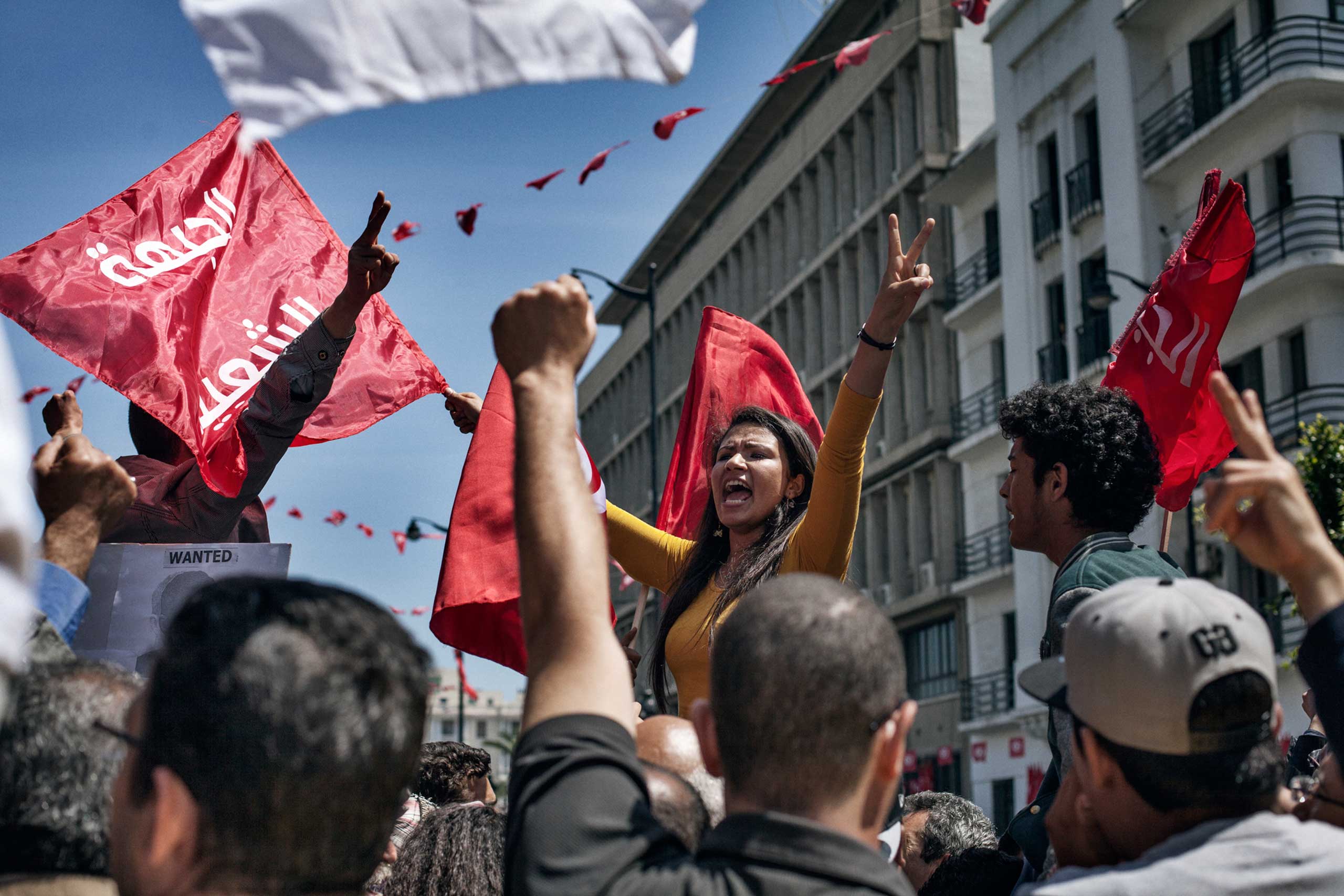 Khouloud, an engineering student, shouts slogans May 2013, during the weekly demonstration in front of the Ministry of Interior asking for progress in the investigation of the assassination of Chokri Belaid. opposition leader Chokri Belaid, was killed by a gunman in Feb. 2013. (Laura Boushnak)