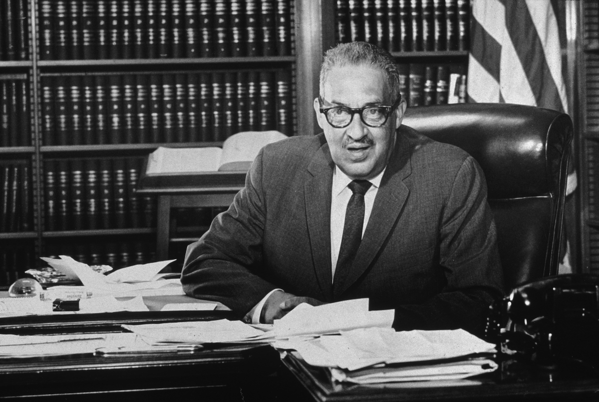 Thurgood Marshall sits behind his desk in his office at the Federal Courthouse, Washington, DC. in 1965 (Sam Falk—Getty Images)