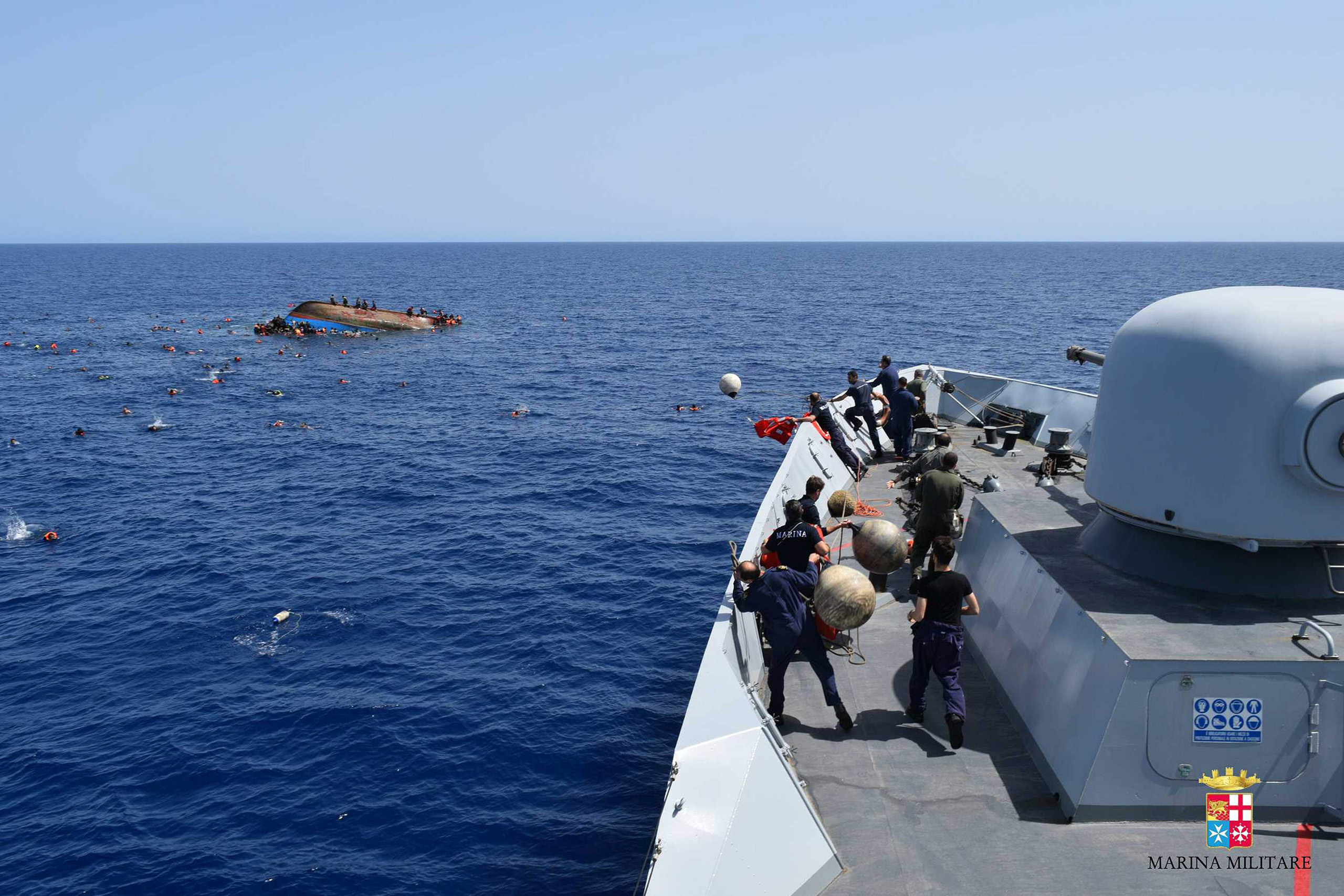 The capsized boat seen from the Italian navy’s Bettica patrol boat. (Italian Navy/AFP/Getty Images)