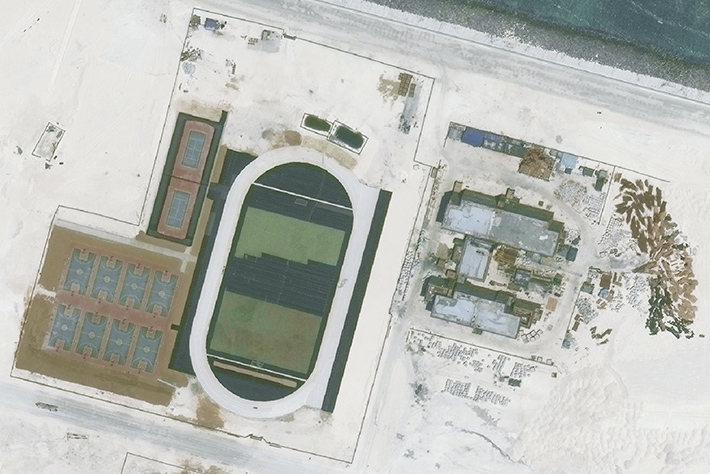 A satellite image of Mischief Reef captured on May 1, 2016, shows a running track, basketball courts and tennis courts.
