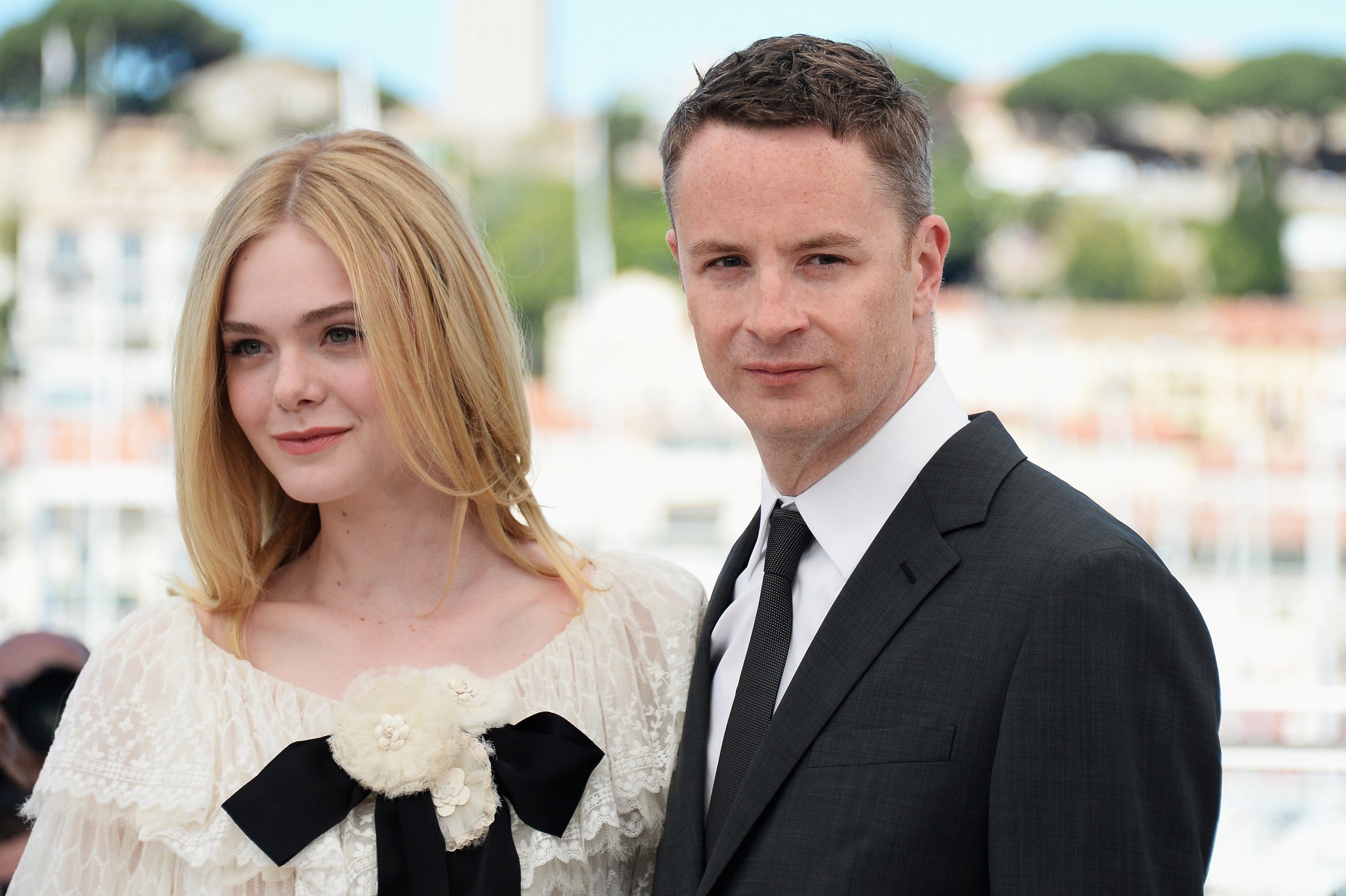 Elle Fanning and director Nicolas Winding Refn during the 69th annual Cannes Film Festival at the Palais des Festivals on May 20, 2016 in Cannes, France.