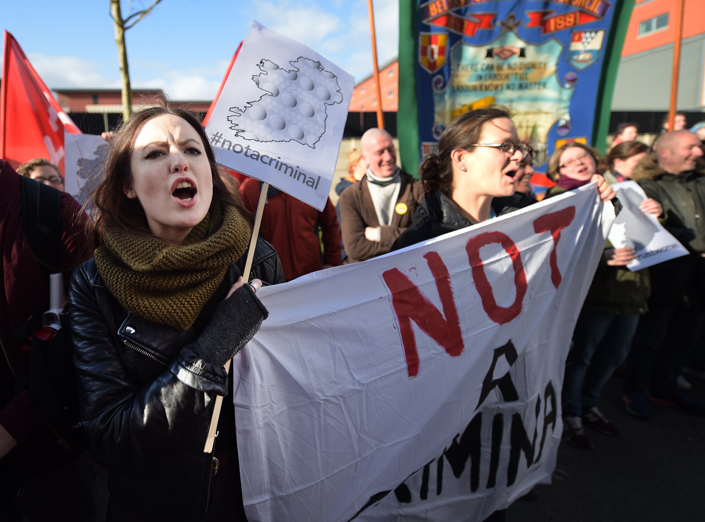 Pro choice supporters protest outside the Public Prosecution Office on April 7, 2016 in Belfast, Northern Ireland.