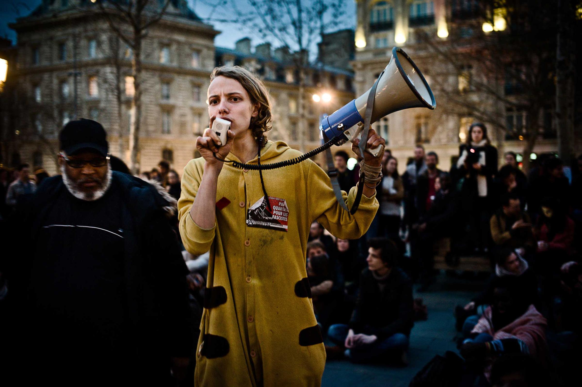 A representative of the Nanterre University students, speaks to the crowds in the Place de la République.