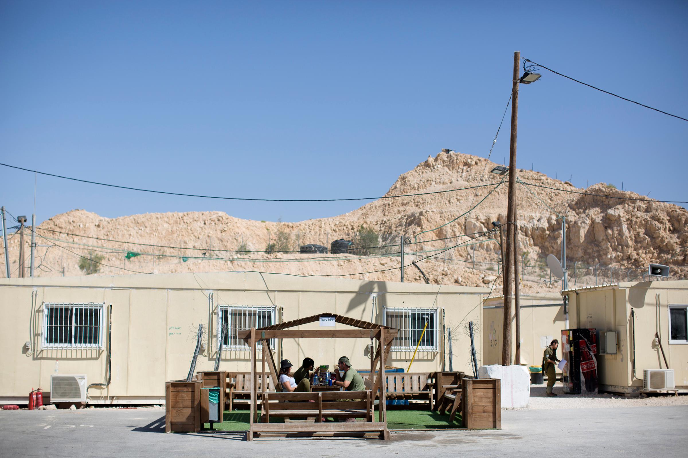 Israeli soldiers rest in a base located on the southern border with Egypt, May 2, 2016.