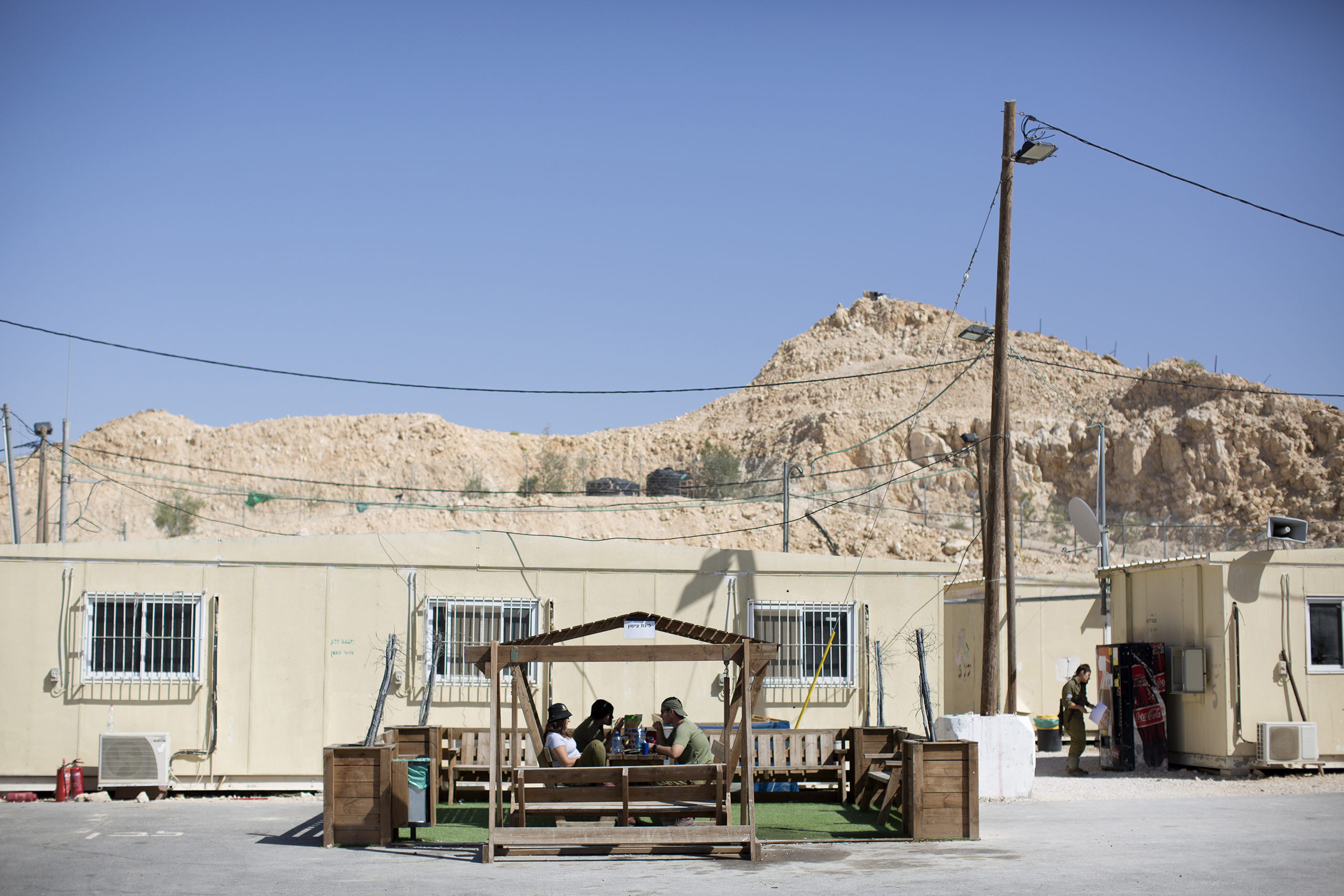 Israeli soldiers rest in a base located on the southern border with Egypt, May 2, 2016. (Oded Balilty—AP for TIME)