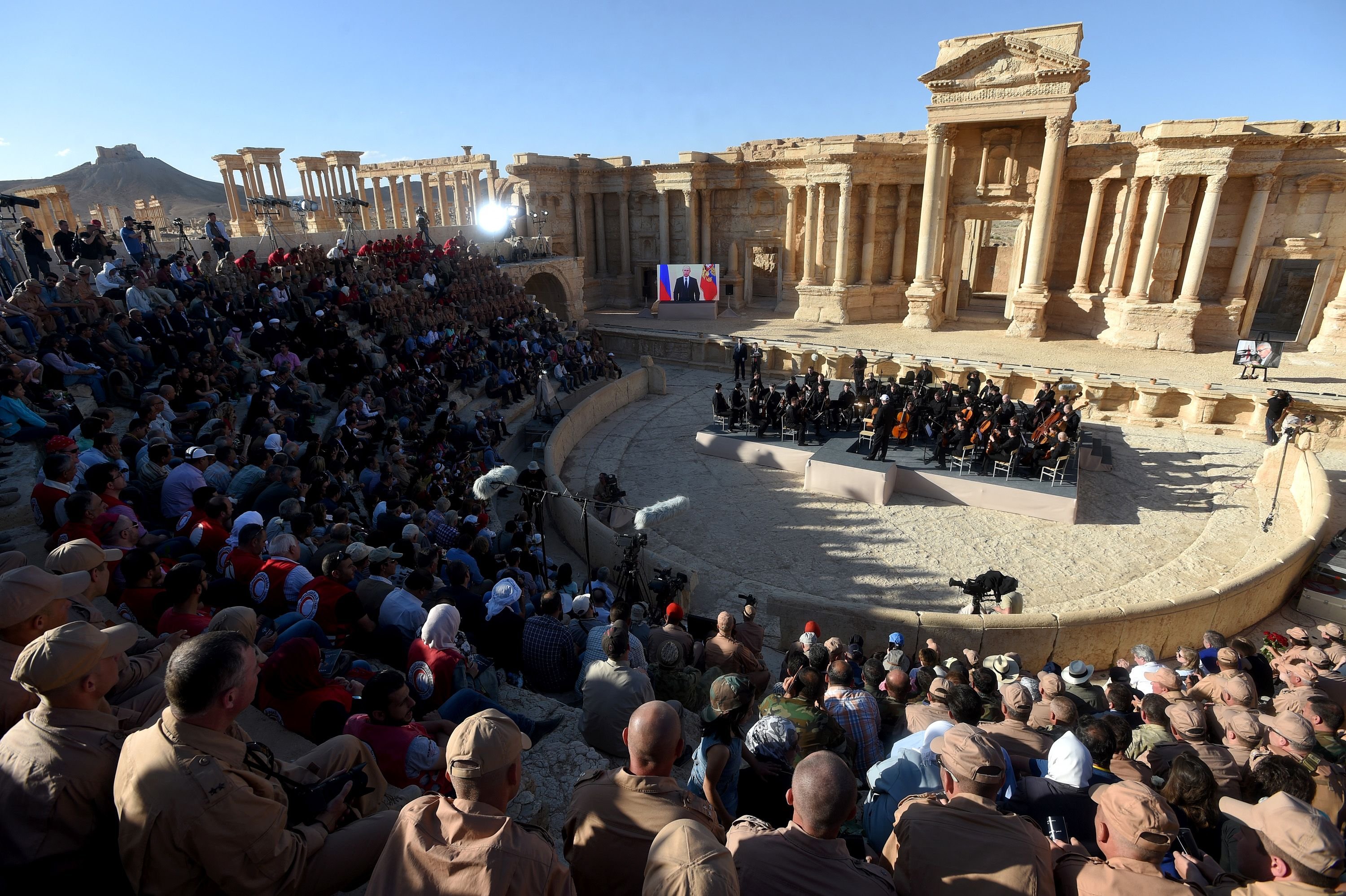 Russian conductor Valery Gergiev leads a concert by the Mariinsky Theater Orchestra in the amphitheatre of the ancient city of Palmyra on May 5, 2016. (Vasily Maxmimov—AFP/Getty Images)