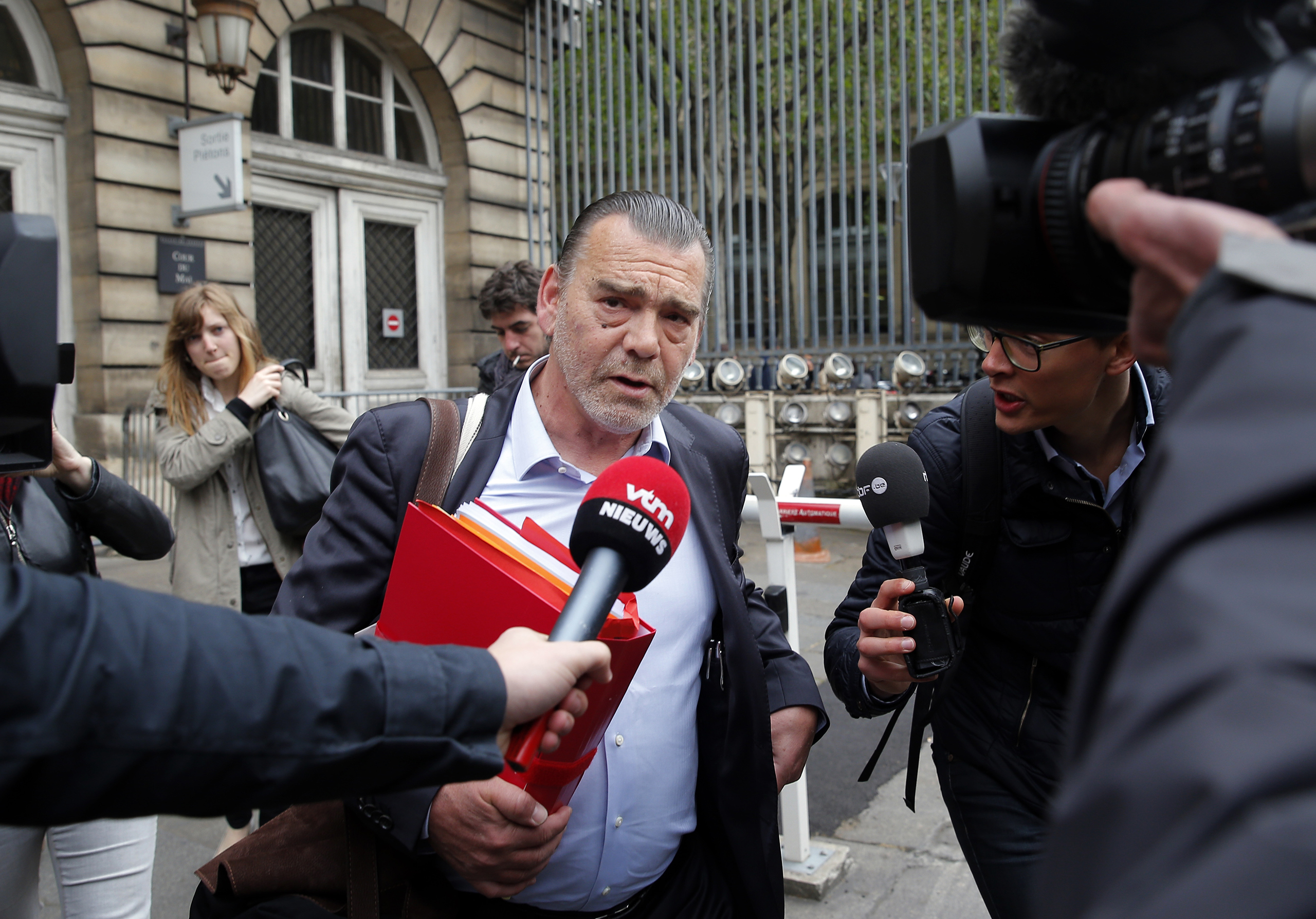 Frank Berton, lawyer of Paris attacks suspect Salah Abdeslam, addresses the media as he arrives at the courthouse In Paris, May 20, 2016. (Christophe Ena—AP)